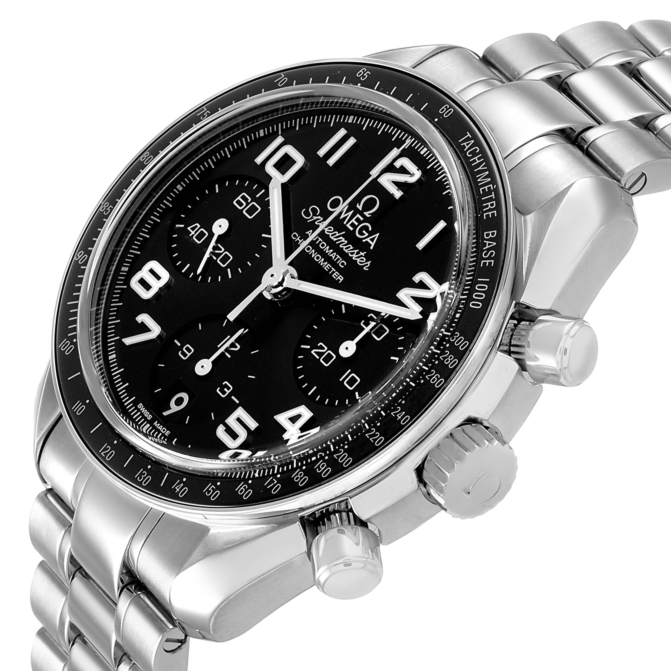 The image shows the Omega Speedmaster 324.30.38.40.06.001 Men's Stainless Steel Grey Dial watch at an angled side view, displaying the dial, crown, pushers, and stainless steel bracelet.
