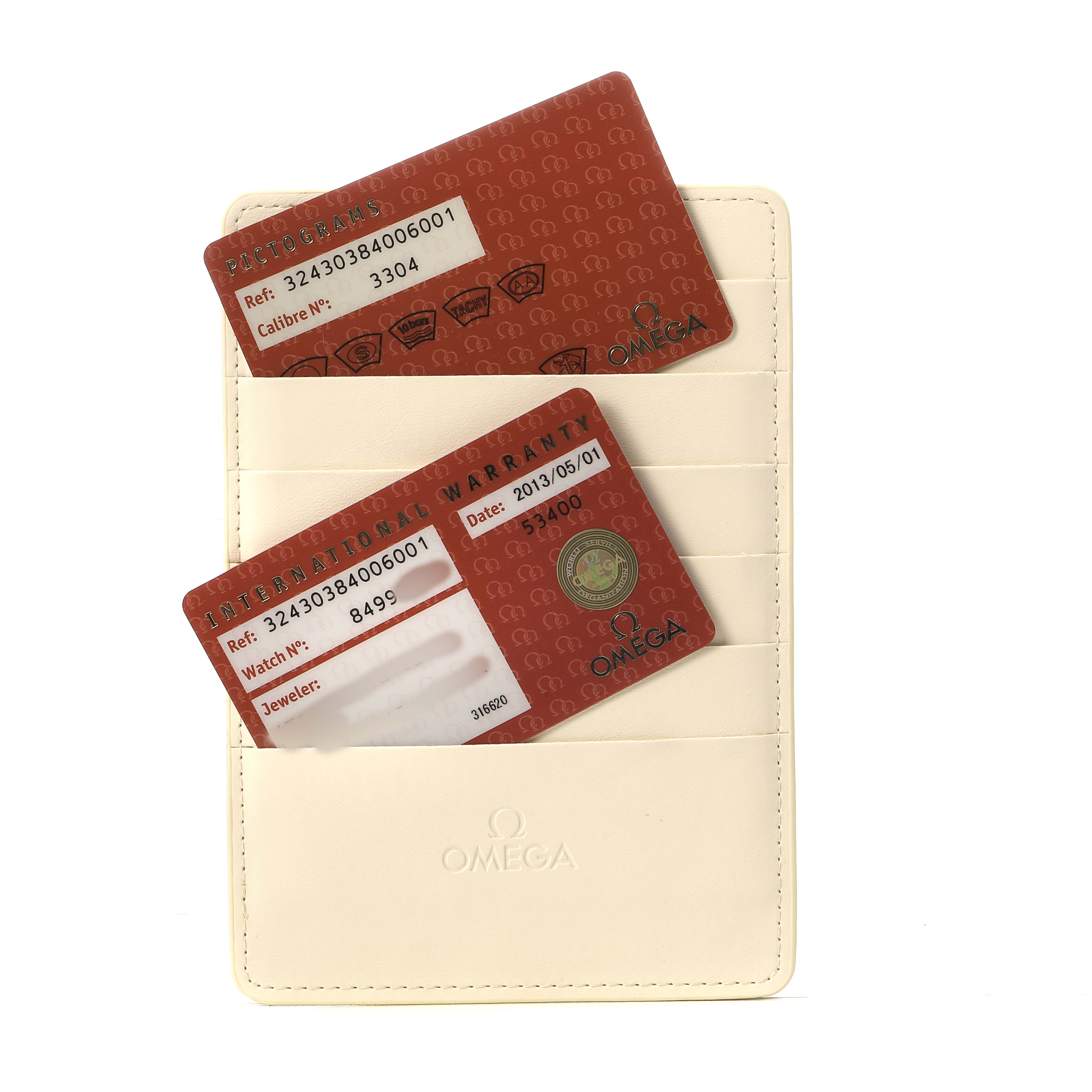 The image shows Omega Speedmaster 324.30.38.40.06.001 Men's Stainless Steel Grey Dial warranty cards and pictogram card placed inside a cream-colored Omega card holder.