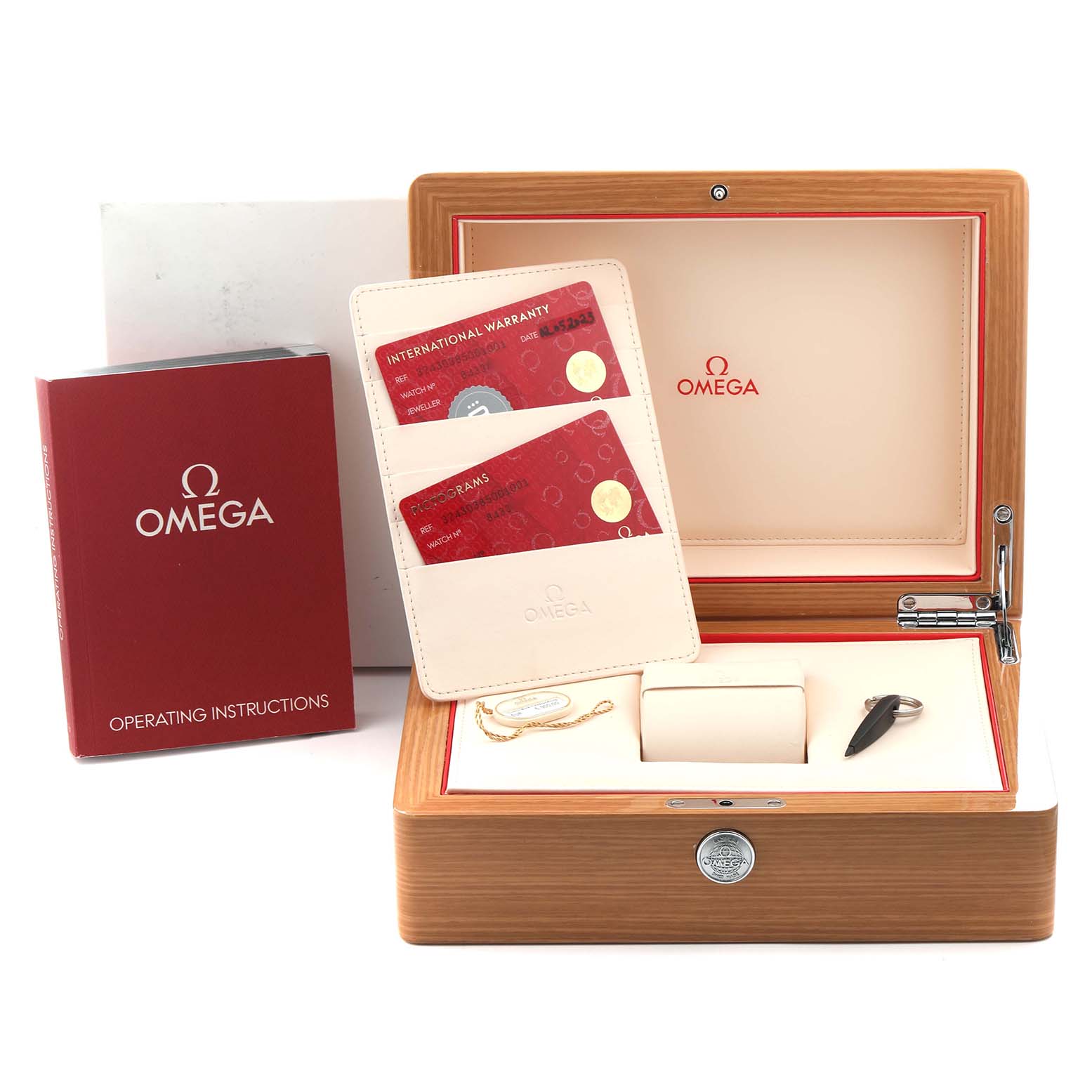 This image shows the packaging and accessories for the Omega Speedmaster 324.30.38.50.01.001 Men
s Stainless Steel Black Dial 324.30.38.50.01.001 Men
s Stainless Steel Black Dial, including the box, warranty cards, and instructions.