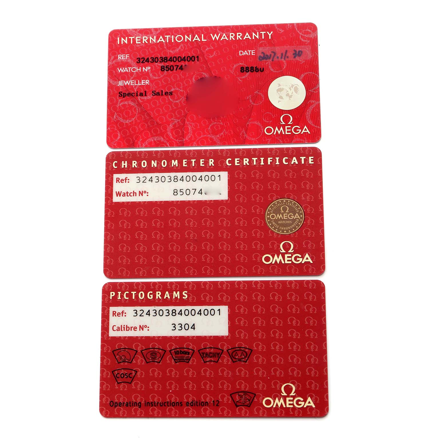 The image shows three Omega Speedmaster 324.30.38.40.04.001 Men
s Stainless Steel White Dial 324.30.38.40.04.001 Men
s Stainless Steel White Dial cards: International Warranty, Chronometer Certificate, and Pictograms.