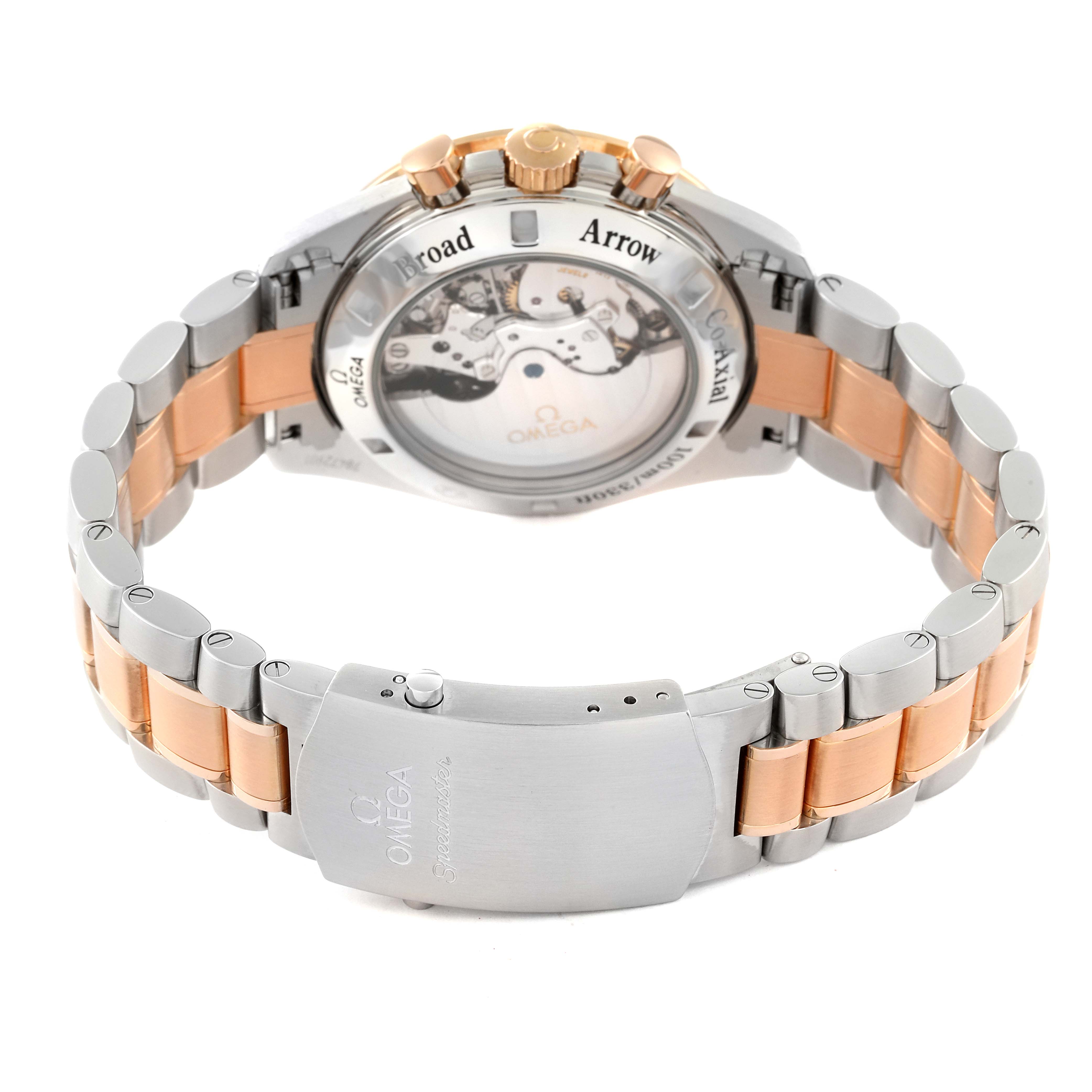 The image shows the back view of an Omega Speedmaster 321.90.42.50.13.001 Men's Steel and Gold (two tone) Brown Dial 321.90.42.50.13.001 Men's Steel and Gold (two tone) Brown Dial watch, highlighting its clasp and partially revealing the movement through the case back.