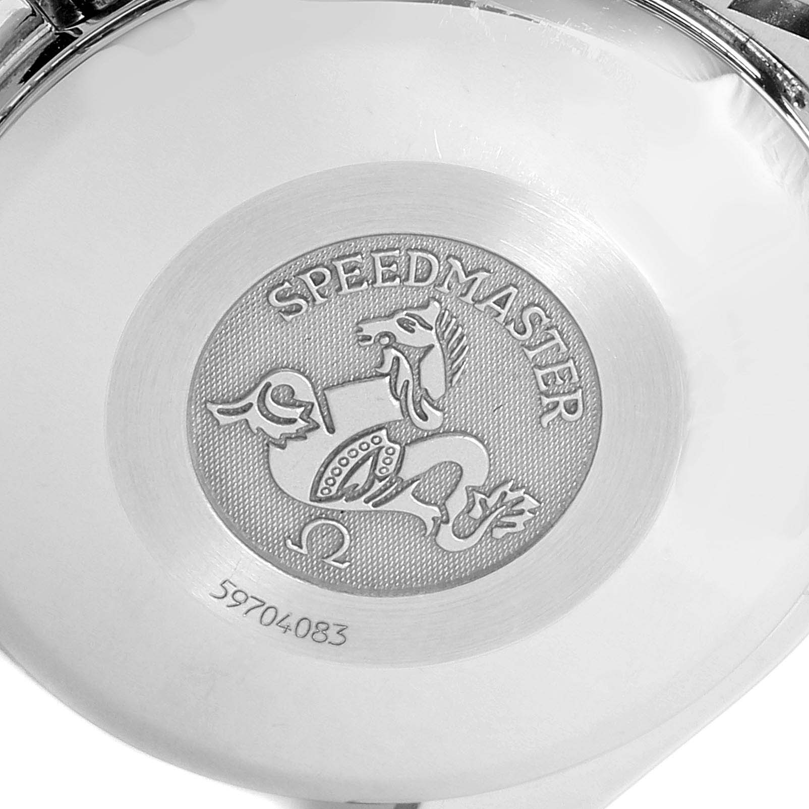 The image shows the case back of an Omega Speedmaster 3513.54.00 Men
s Stainless Steel Black Dial 3513.54.00 Men
s Stainless Steel Black Dial watch, featuring its engraved logo and serial number.