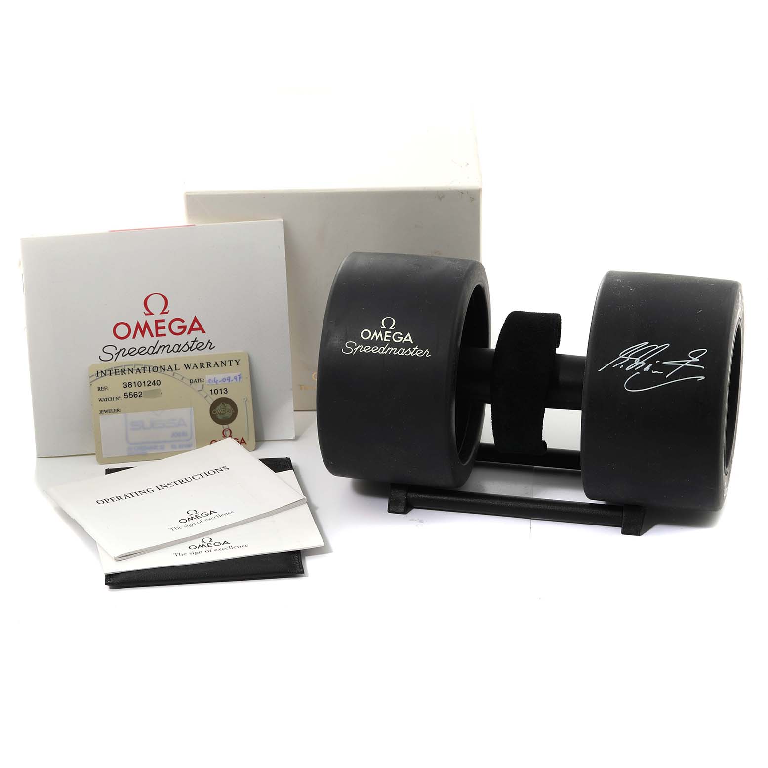 The image shows Omega Speedmaster 3810.12.40 Men's Stainless Steel Yellow Dial 3810.12.40 Men's Stainless Steel Yellow Dial accessories, including a box, warranty card, instructions, and a special case.