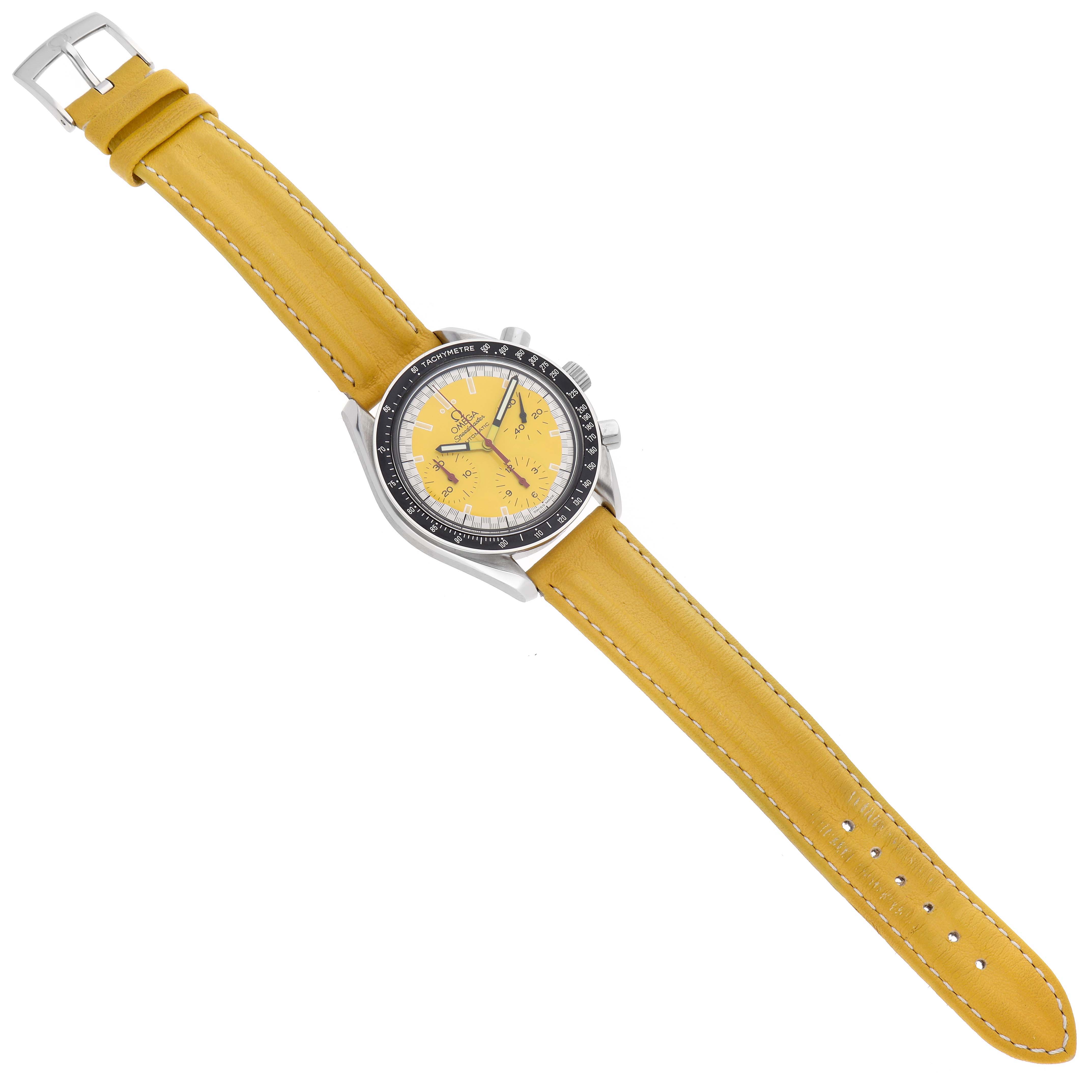 The image shows an Omega Speedmaster 3810.12.40 Men's Stainless Steel Yellow Dial 3810.12.40 Men's Stainless Steel Yellow Dial watch with a yellow strap, seen from a top-down angle.
