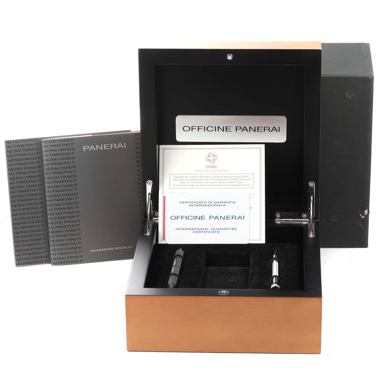 The image shows an open box for a Panerai Luminor PAM00241 Men
s Stainless Steel Black Dial PAM00241 Men
s Stainless Steel Black Dial watch with documents and watch tools.