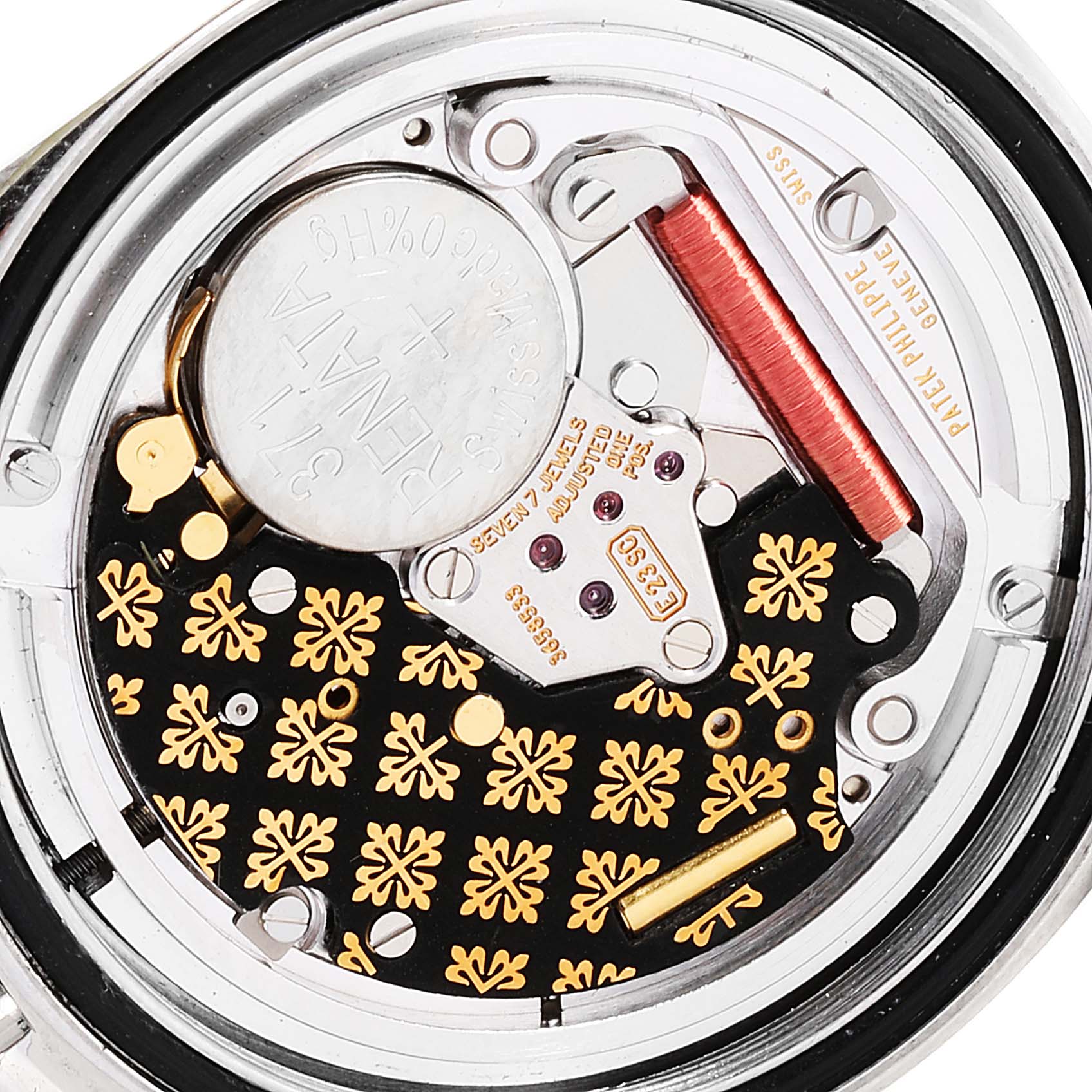 This image shows a close-up view of the Aquanaut model by Patek Philippe, focusing on the watch's intricate movement and internal components.