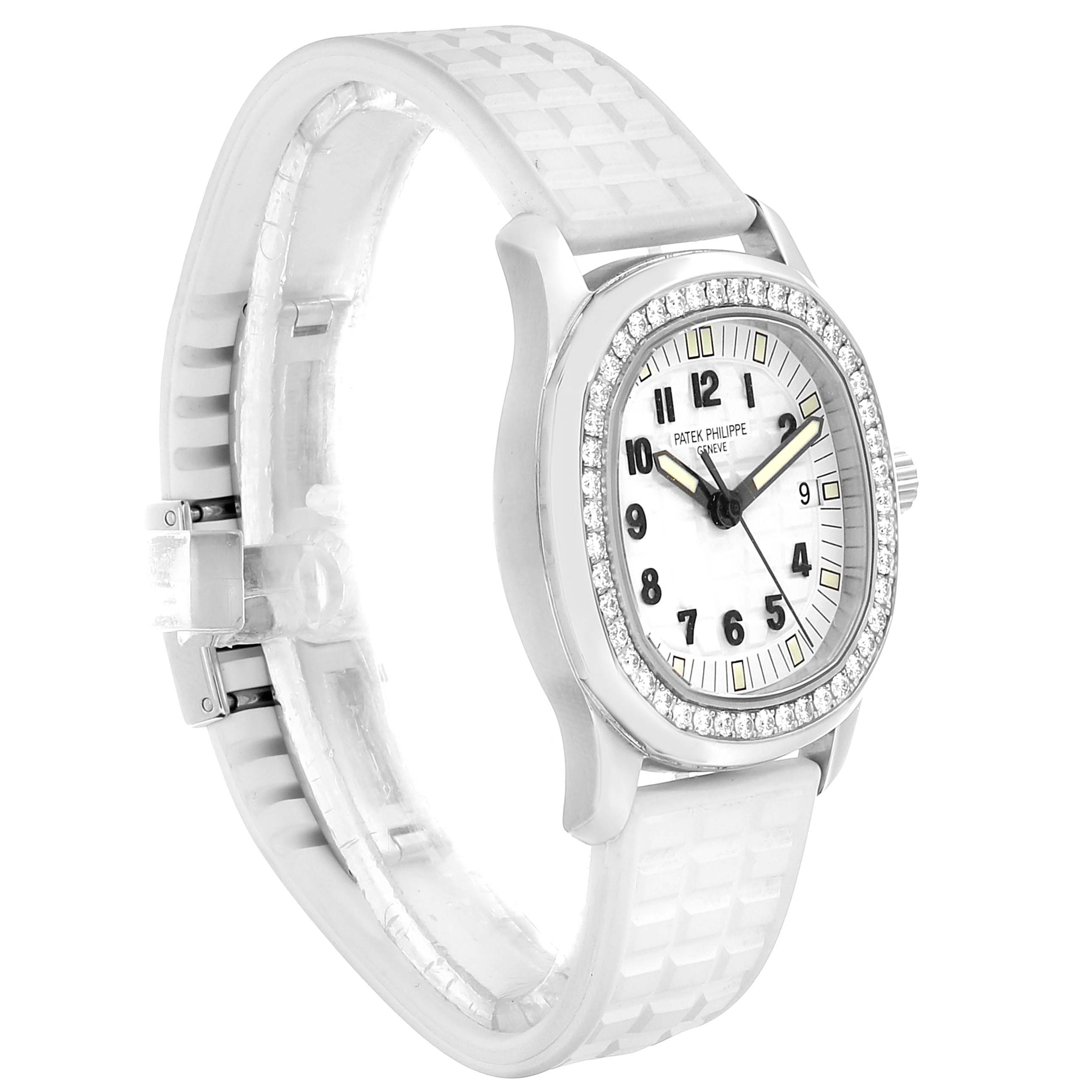 The image shows a Patek Philippe Aquanaut 5067 Women's Stainless Steel White Dial 5067 Women's Stainless Steel White Dial watch from a side angle, highlighting its white strap and diamond bezel.