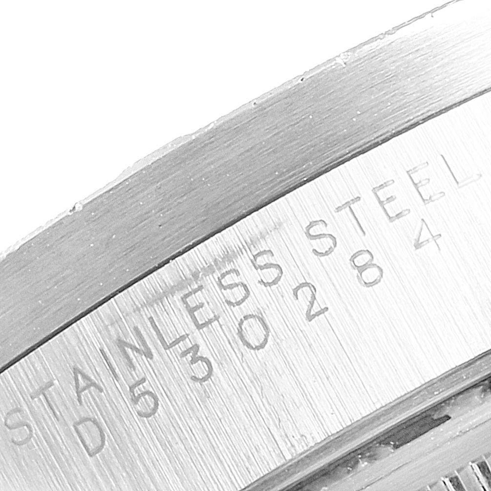 This image shows a close-up of the engraved text on the stainless steel case of the Rolex Air-King 14010 Men's Stainless Steel Black Dial 14010 Men's Stainless Steel Black Dial watch.