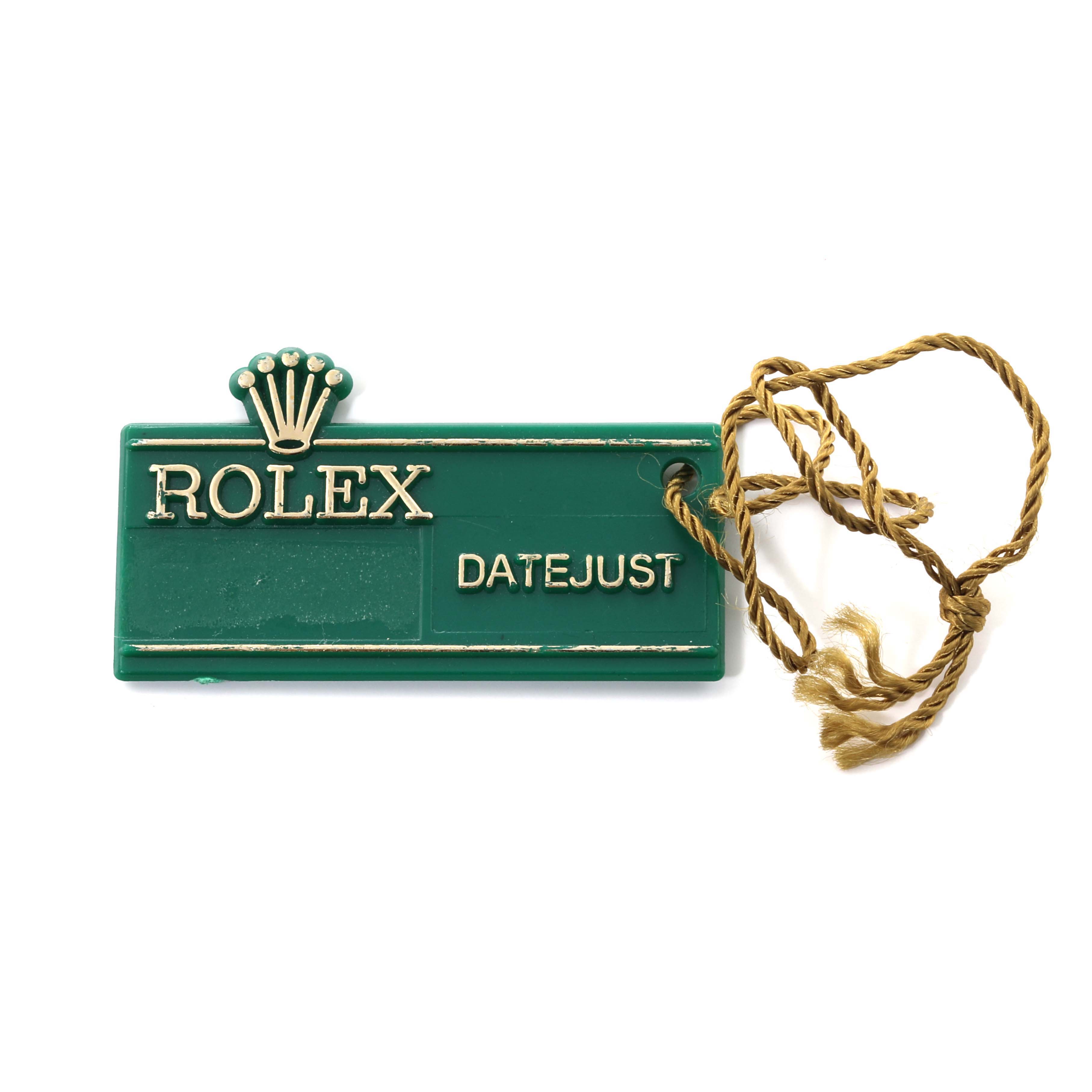 This image shows a Rolex Datejust tag, typically attached to the watch, from a top-down angle.