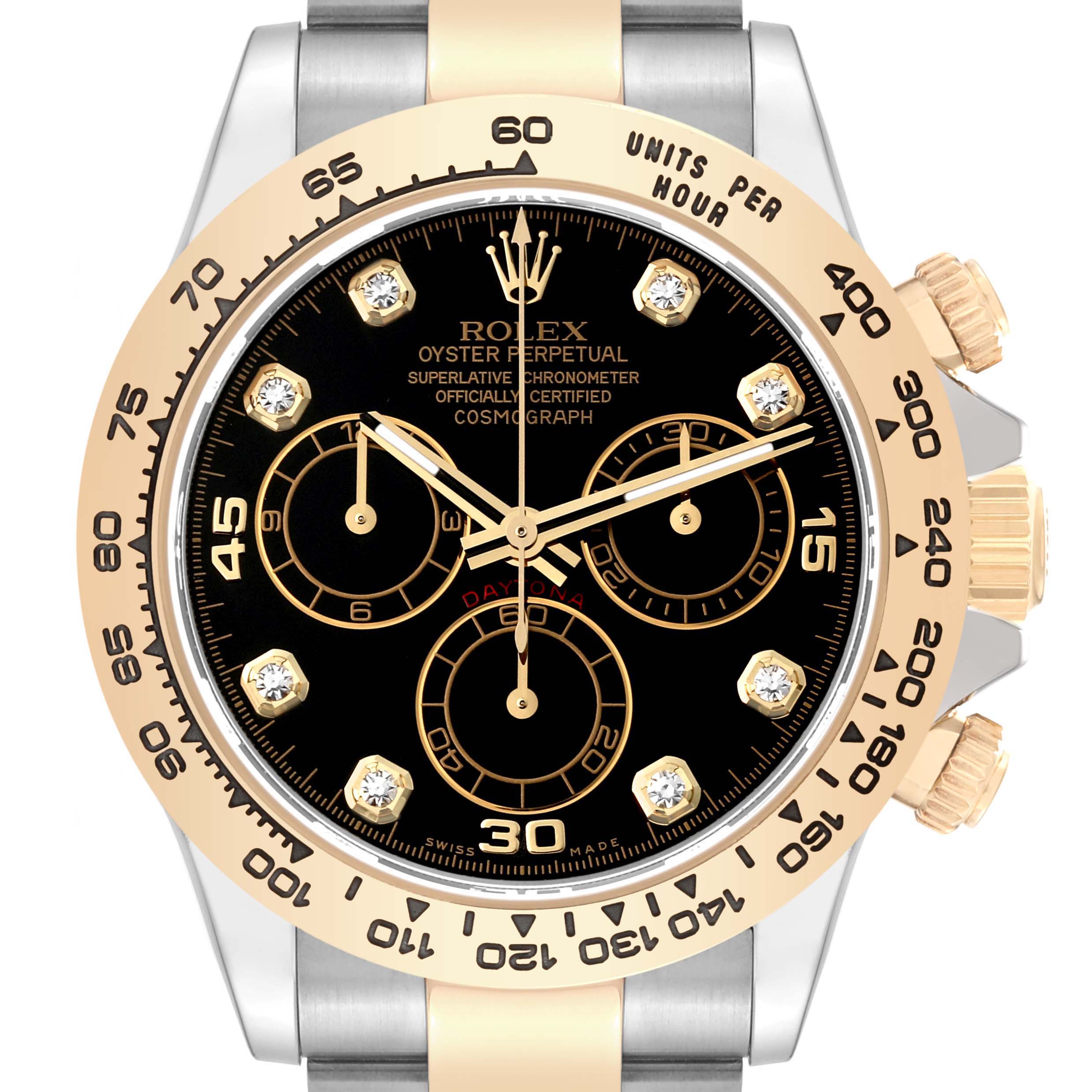 The image shows a front view of a Rolex Daytona 116503 Men
s Steel and Gold (two tone) Black Dial 116503 Men
s Steel and Gold (two tone) Black Dial watch, highlighting the dial, bezel, and part of the bracelet.