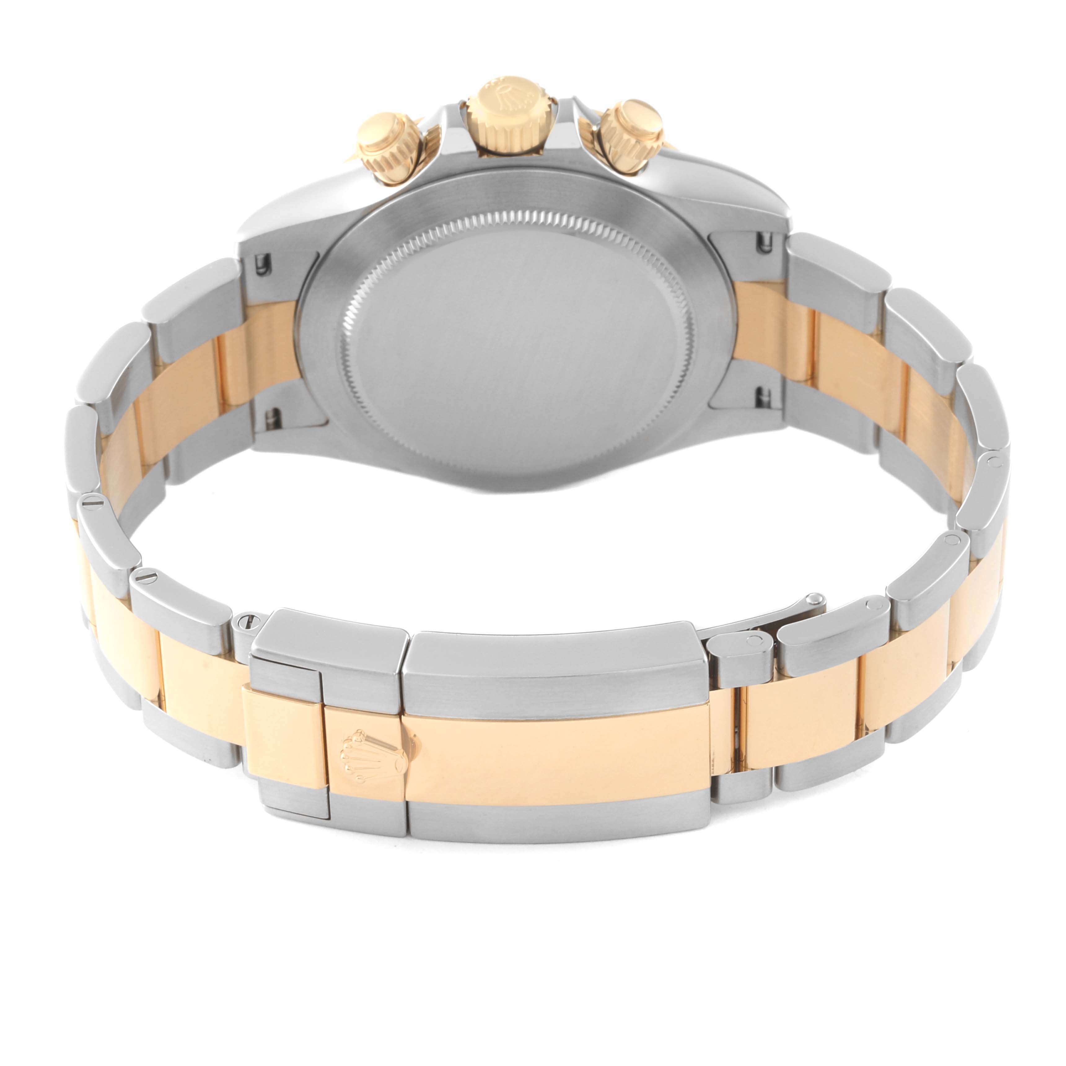 The image shows the back, bracelet, and clasp of a Rolex Daytona 116503 Men
s Steel and Gold (two tone) Black Dial 116503 Men
s Steel and Gold (two tone) Black Dial watch in two-tone metal.