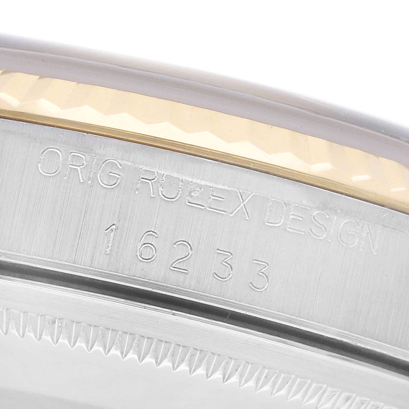 The close-up image shows the case edge and bezel of a Rolex Datejust 16233 Men
s Steel and Gold (two tone) Champagne Dial 16233 Men
s Steel and Gold (two tone) Champagne Dial, displaying "ORIG ROLEX DESIGN" and the model number.