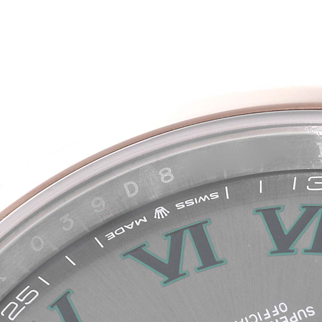 The image shows a close-up of the upper part of the dial, bezel, and rehaut of a Rolex Datejust 41 126301 Men's Steel and Gold (two tone) Grey Dial 126301 Men's Steel and Gold (two tone) Grey Dial watch.
