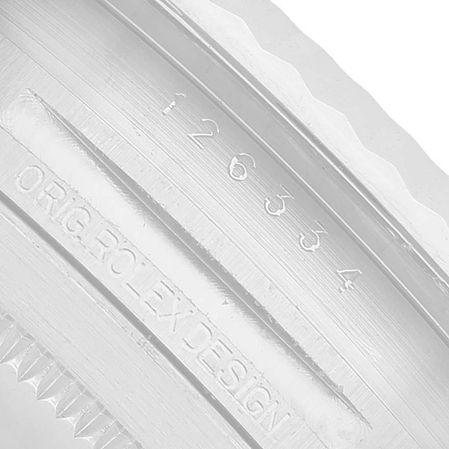 The image shows a close-up of the Rolex Datejust 41 126334 Men's Stainless Steel Grey Dial's inner bezel with engraved serial and design numbers.
