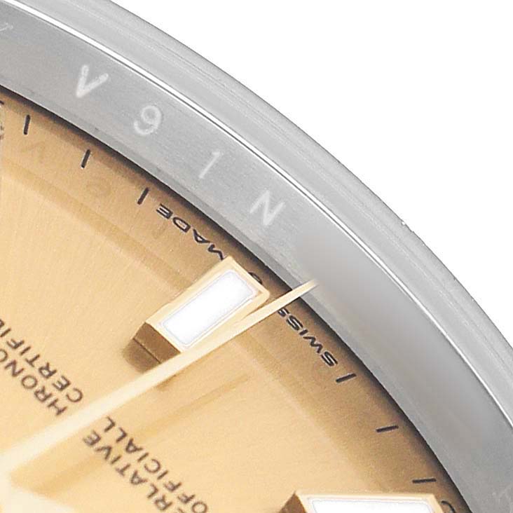 The image shows a close-up of the dial and bezel of the Rolex Datejust 41 126333 Men's Steel and Gold (two tone) Champagne Dial, highlighting markers and part of the face.