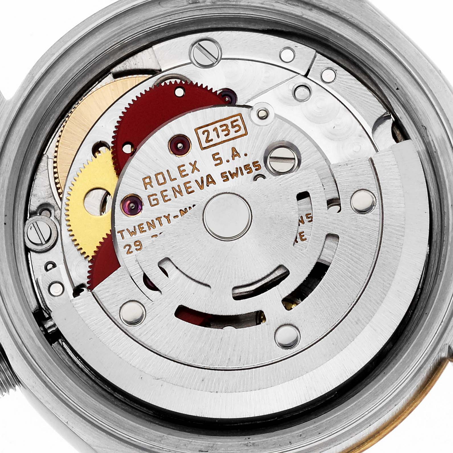 This image shows the internal mechanism of a Rolex Datejust 69173 Women's Steel and Gold (two tone) Beige Dial 69173 Women's Steel and Gold (two tone) Beige Dial watch, focusing on its intricate gear and rotor assembly.