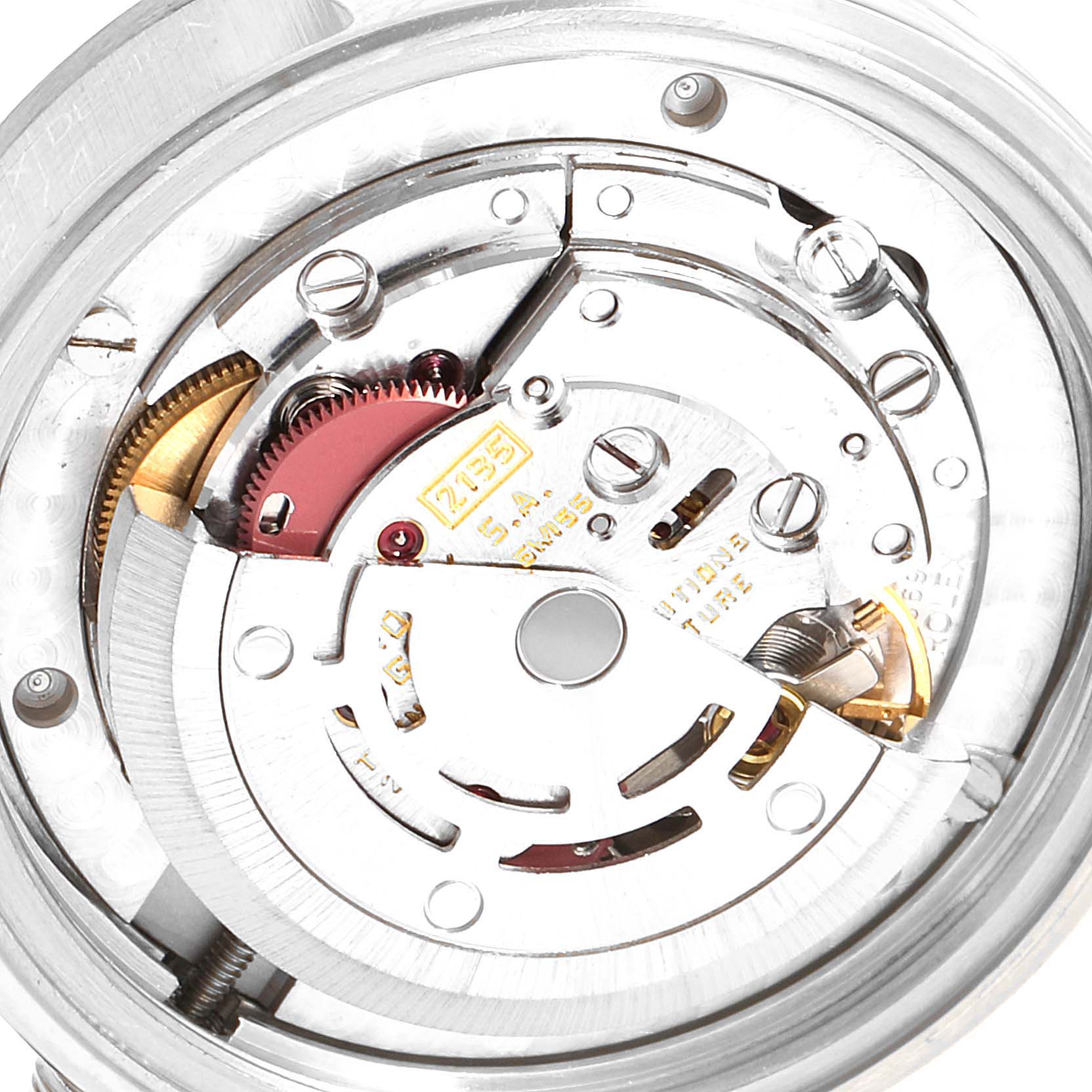 The image shows the internal mechanism with gears and components of a Rolex Datejust 68274 Women's Stainless Steel Silver Dial 68274 Women's Stainless Steel Silver Dial watch from a top-down angle.