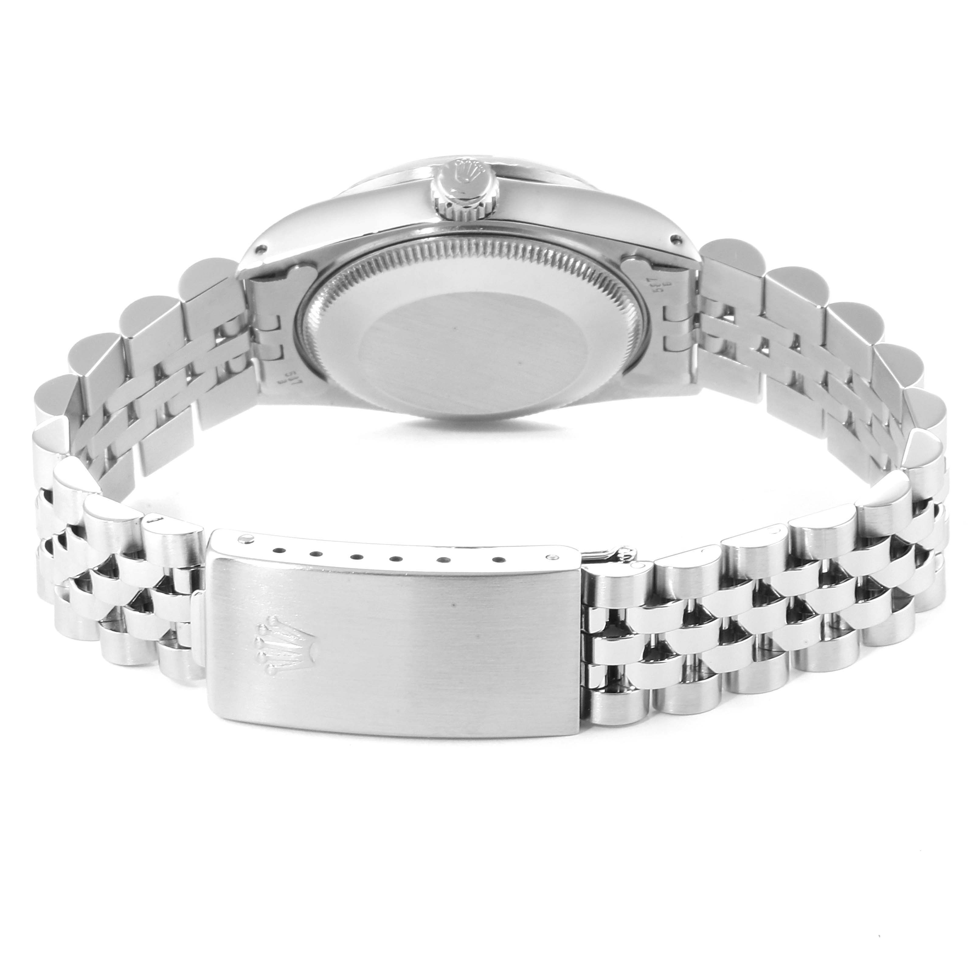 The image shows the back view of the Rolex Datejust 68274 Women's Stainless Steel Silver Dial 68274 Women's Stainless Steel Silver Dial watch, highlighting its case back, crown, and bracelet with clasp.