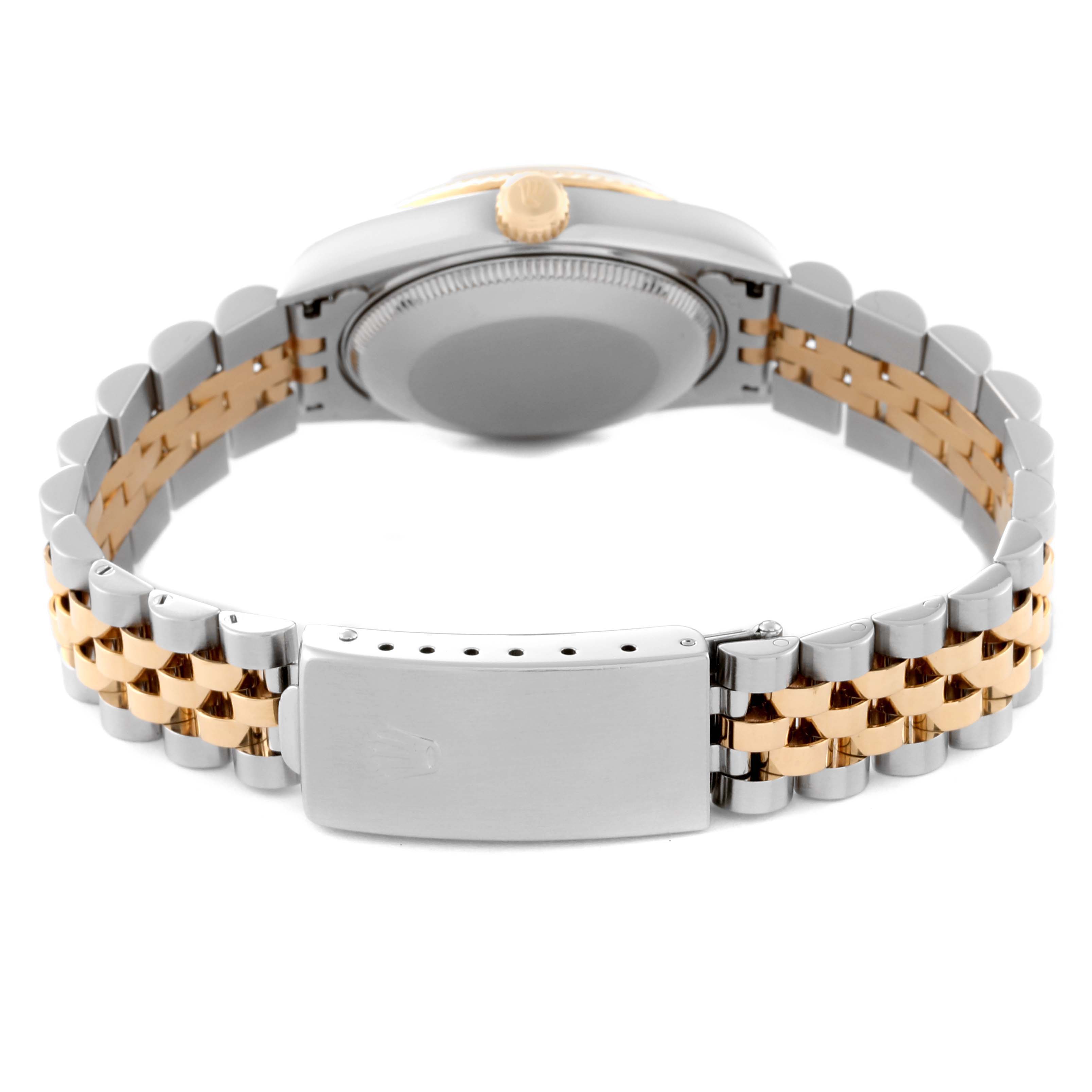 The image shows the back view of a Rolex Mid-Size 78273 Women's Steel and Gold (two tone) Red Dial 78273 Women's Steel and Gold (two tone) Red Dial watch, highlighting the clasp and the bracelet.