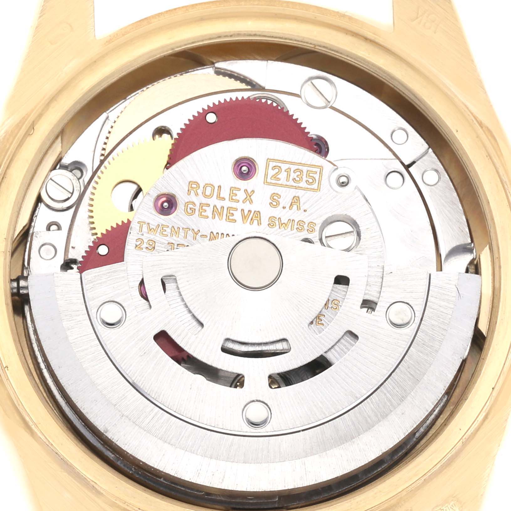 This image shows a close-up of the Rolex President 69178 Women's Yellow Gold Beige Dial 69178 Women's Yellow Gold Beige Dial model's movement and rotor, highlighting its intricate internal components.