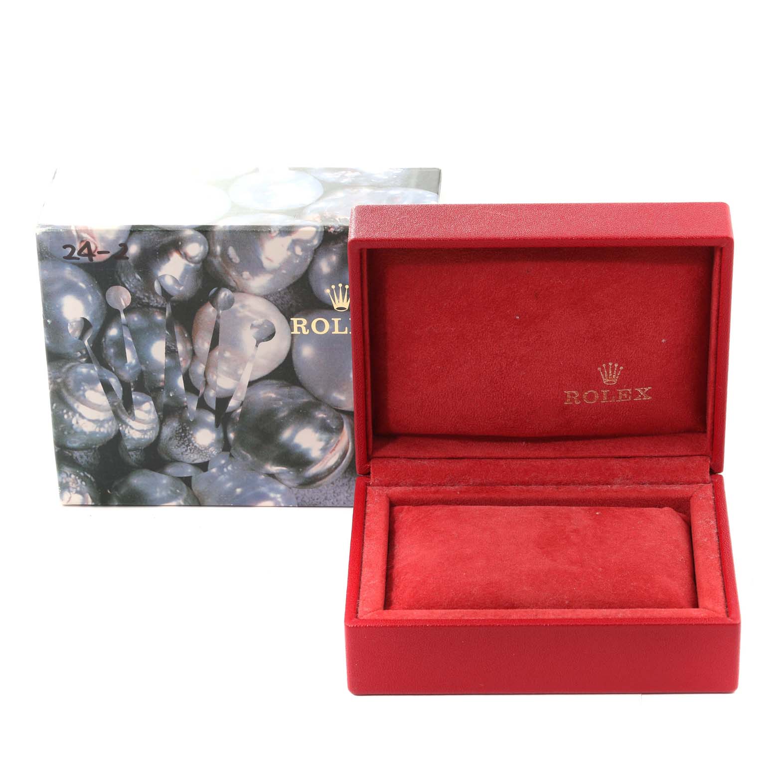 This image shows an open red Rolex President 69178 Women's Yellow Gold Beige Dial 69178 Women's Yellow Gold Beige Dial watch box with a cushion inside and the outer packaging in the background.