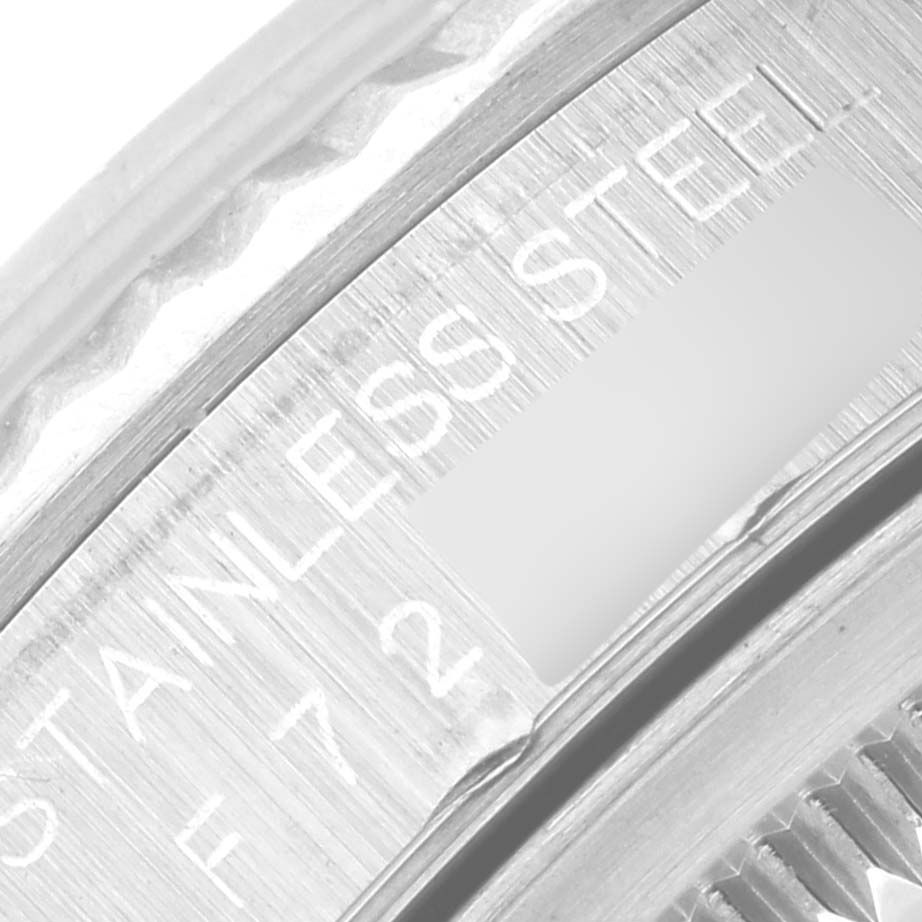 The image shows a close-up of the Rolex Datejust 16234 Men's Stainless Steel Silver Dial 16234 Men's Stainless Steel Silver Dial model, focusing on the inner bezel with "STAINLESS STEEL" engraved.