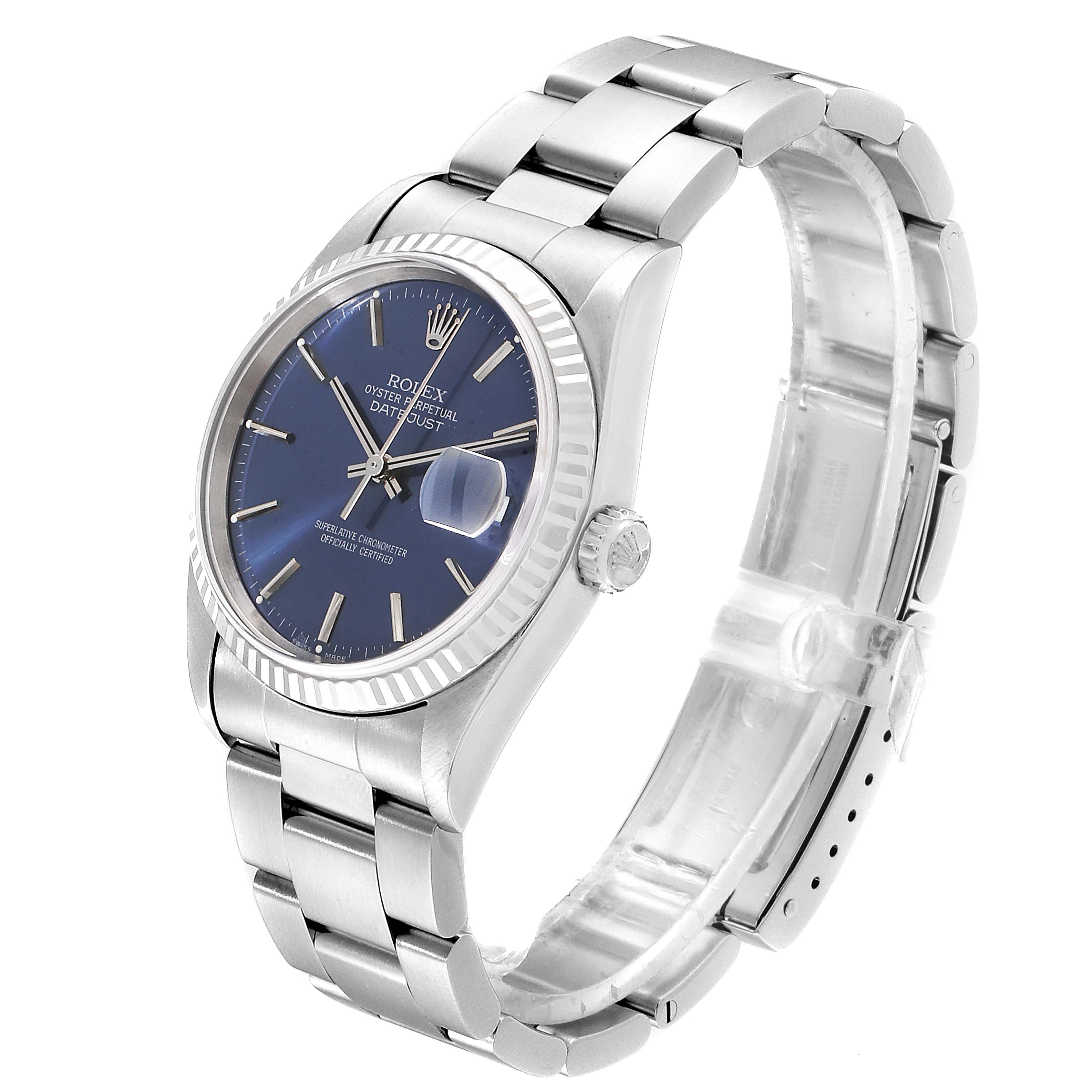 The image shows a Rolex Datejust 16234 Men
s Stainless Steel Blue Dial 16234 Men
s Stainless Steel Blue Dial watch at a 45-degree angle, highlighting the blue dial, fluted bezel, crown, and oyster bracelet.