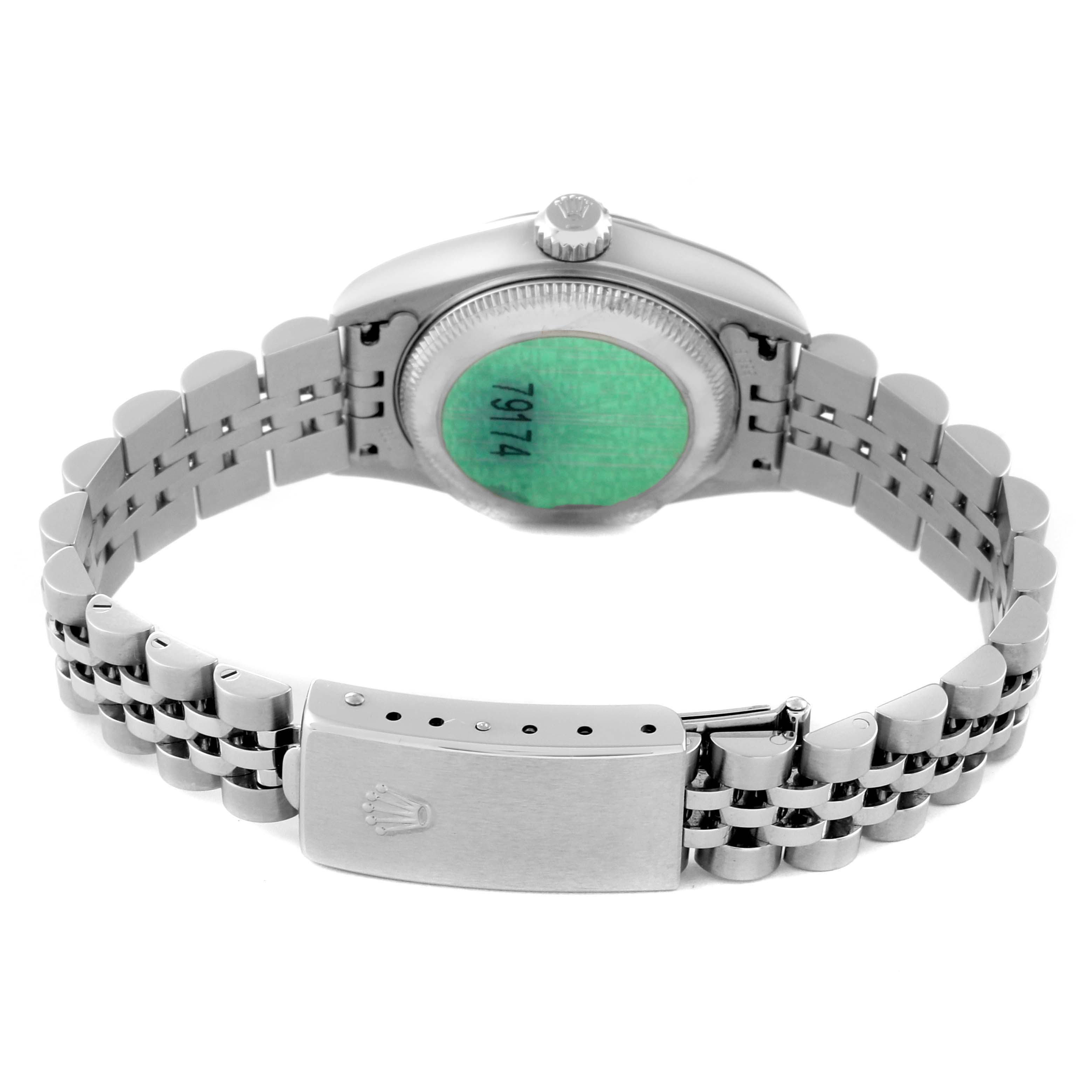 This image shows the back of a Rolex Datejust 79174 Women's Stainless Steel White Dial 79174 Women's Stainless Steel White Dial watch, highlighting the case back, bracelet, and clasp.