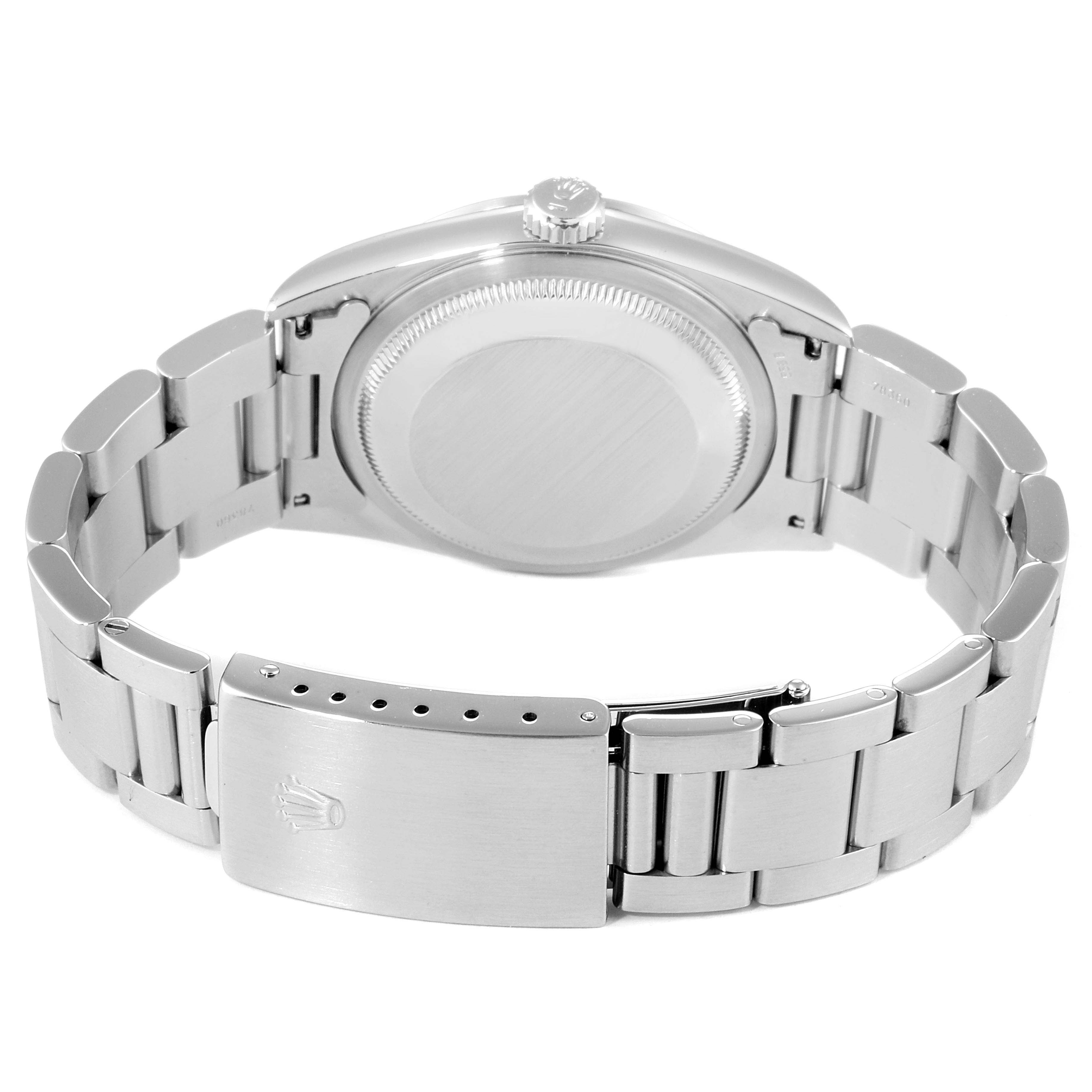 The image shows the back view and clasp of a Rolex Datejust 16200 Men's Stainless Steel White Dial 16200 Men's Stainless Steel White Dial watch, focusing on the bracelet and case back.