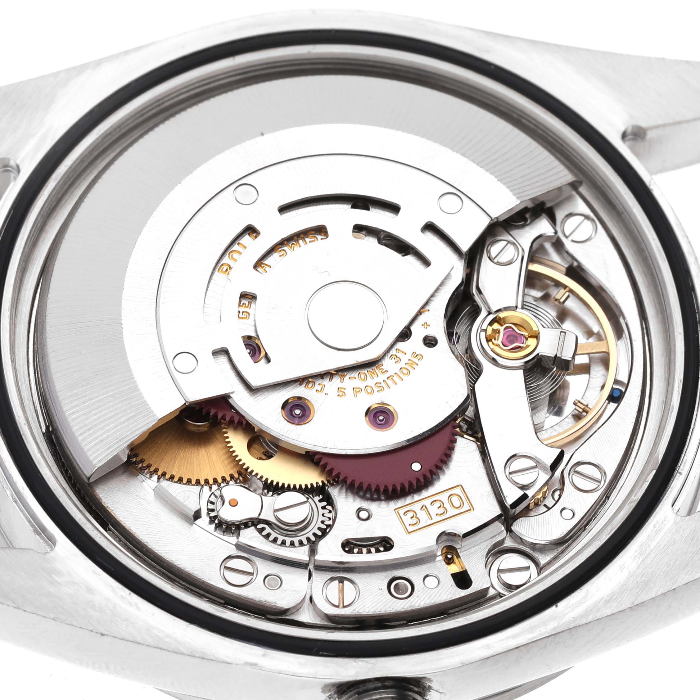 The image shows a close-up view of the internal movement components of a Rolex Explorer 114270 Men
s Stainless Steel Black Dial 114270 Men
s Stainless Steel Black Dial watch.