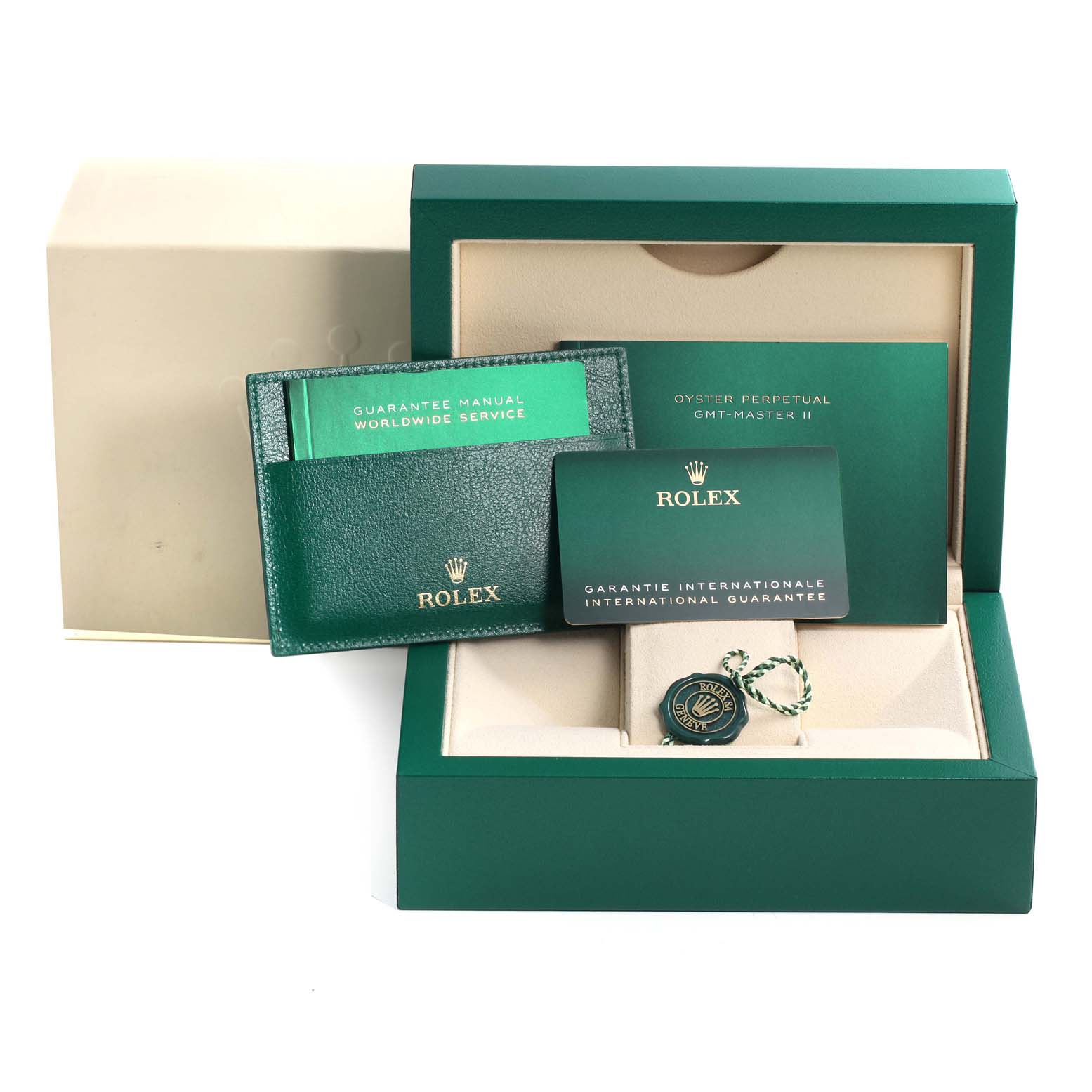 The image shows the packaging and accessories, including booklets and tags, for a Rolex GMT-Master 126710BLNR Men's Stainless Steel Black Dial 126710BLNR Men's Stainless Steel Black Dial II.