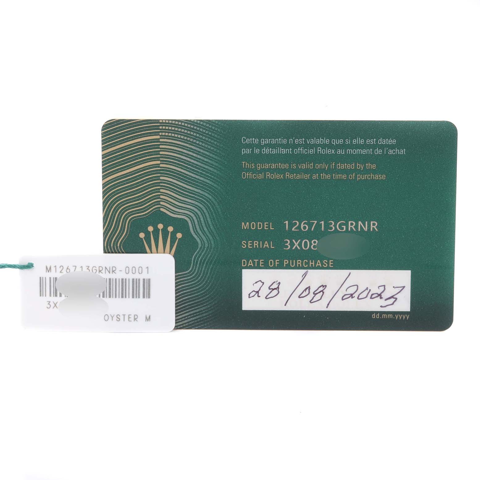 The image shows a warranty and model card for the Rolex GMT-Master 126713 Men's Steel and Gold (two tone) Black Dial 126713 Men's Steel and Gold (two tone) Black Dial, model 126713GRNR, with purchase details and a tag attached.