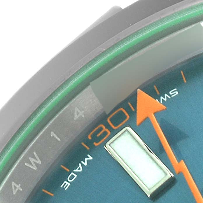 The image shows a close-up of the dial, minute markers, and the second hand of a Rolex Milgauss 116400 Men's Stainless Steel Blue Dial 116400 Men's Stainless Steel Blue Dial watch.