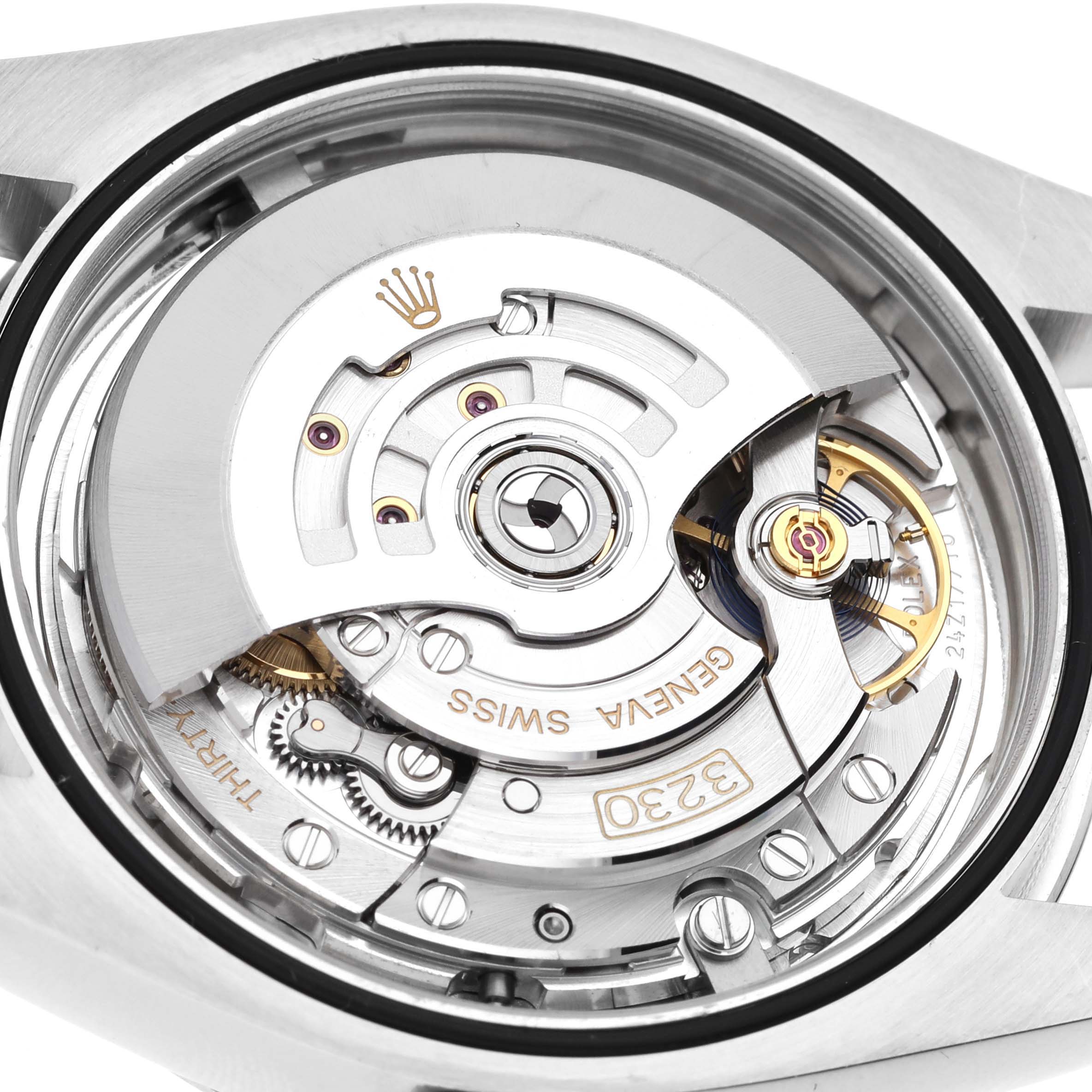 This image shows the back of the Rolex Oyster Perpetual 124300 Men
s Stainless Steel Silver Dial 124300 Men
s Stainless Steel Silver Dial watch, revealing the intricate internal movement mechanisms.