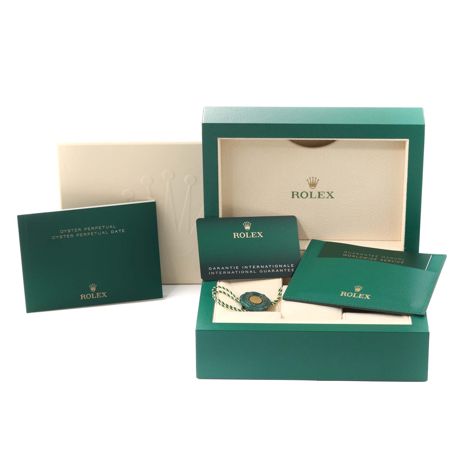 The image shows the packaging and accessories of a Rolex Oyster Perpetual 124300 Men's Stainless Steel Black Dial 124300 Men's Stainless Steel Black Dial model, including warranty card and manuals.
