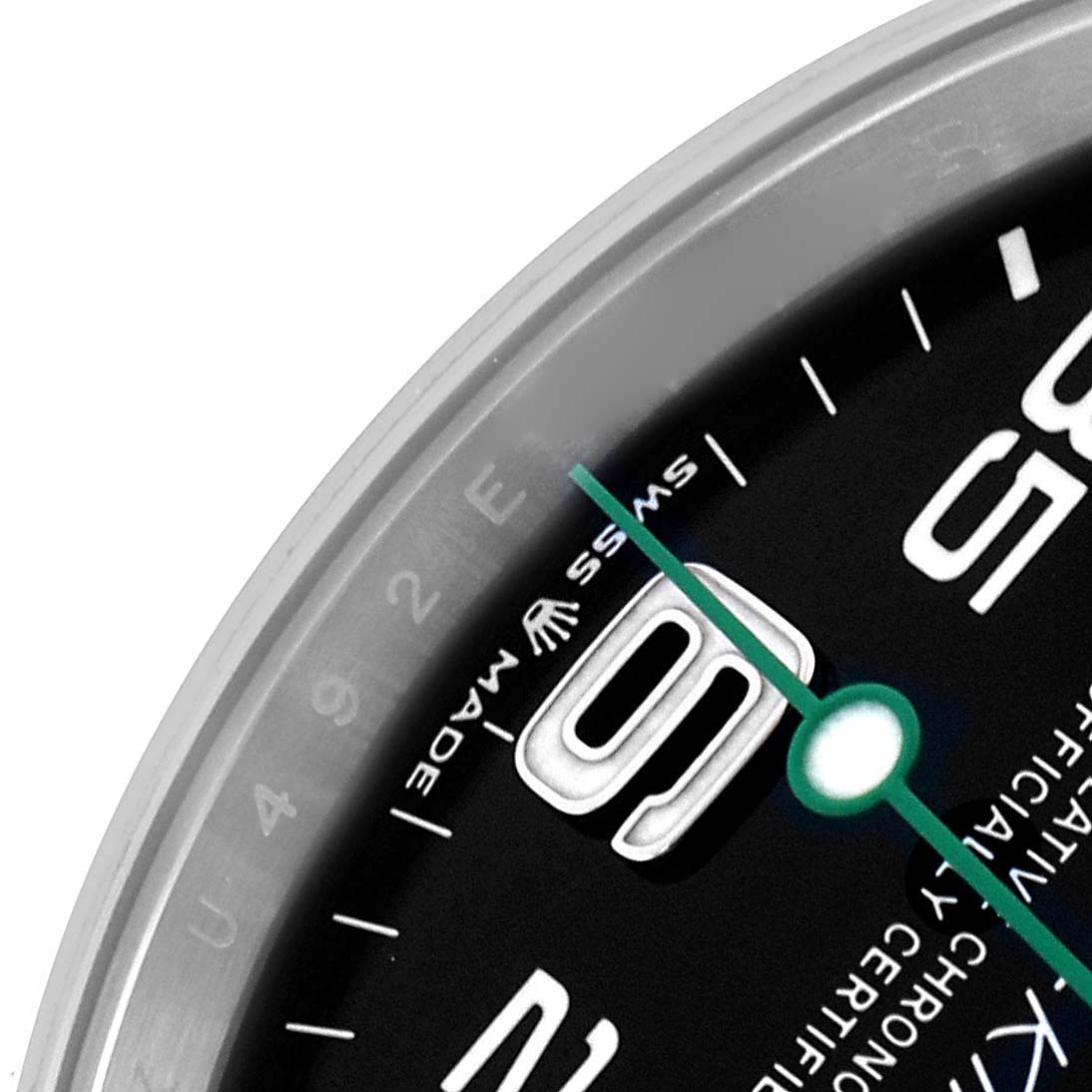 The image shows a close-up of the dial and hands of a Rolex Air-King 126900 Men
s Stainless Steel Black Dial 126900 Men
s Stainless Steel Black Dial watch, focusing on the numerals and minute markers.