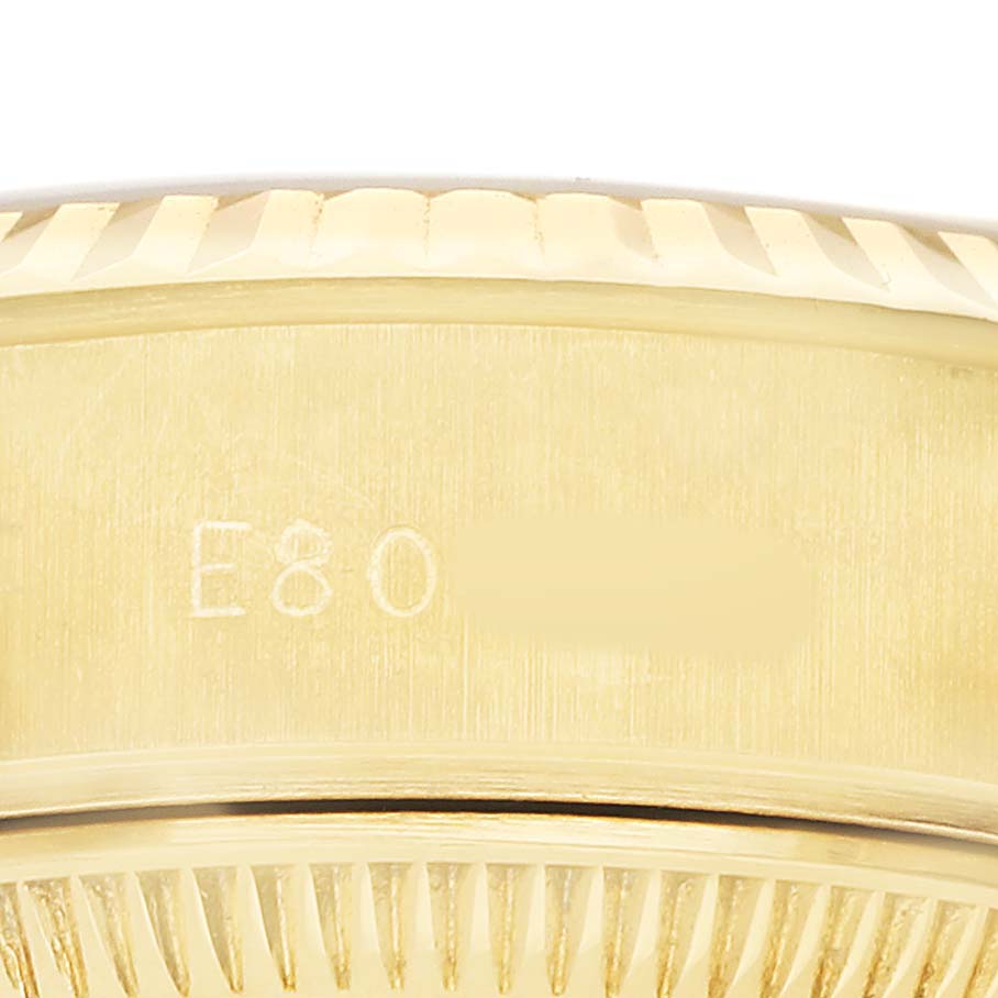 The image shows a close-up of the side of a Rolex President 69178 Women's Yellow Gold White Dial watch, highlighting the model number engraving.