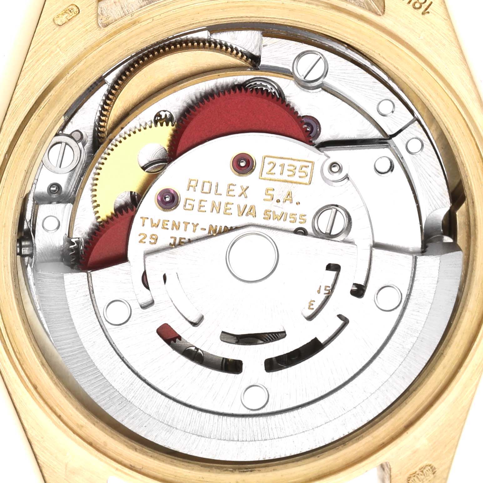 The image shows the movement of a Rolex President 69178 Women's Yellow Gold White Dial model, highlighting gears and components from the back.