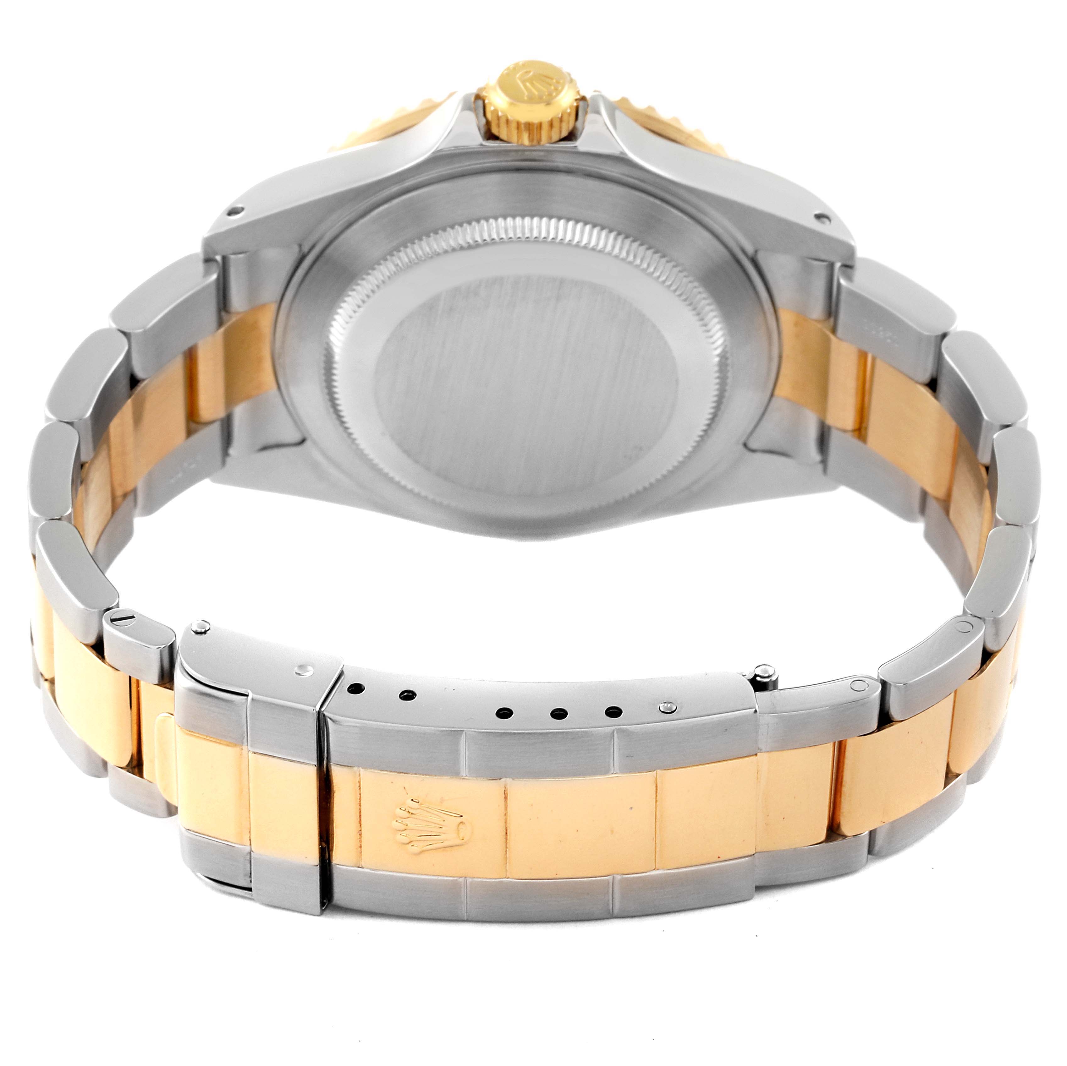 The image shows the back case and bracelet of a Rolex Submariner 16613 Men's Steel and Gold (two tone) Blue Dial 16613 Men's Steel and Gold (two tone) Blue Dial watch at a rear angle.