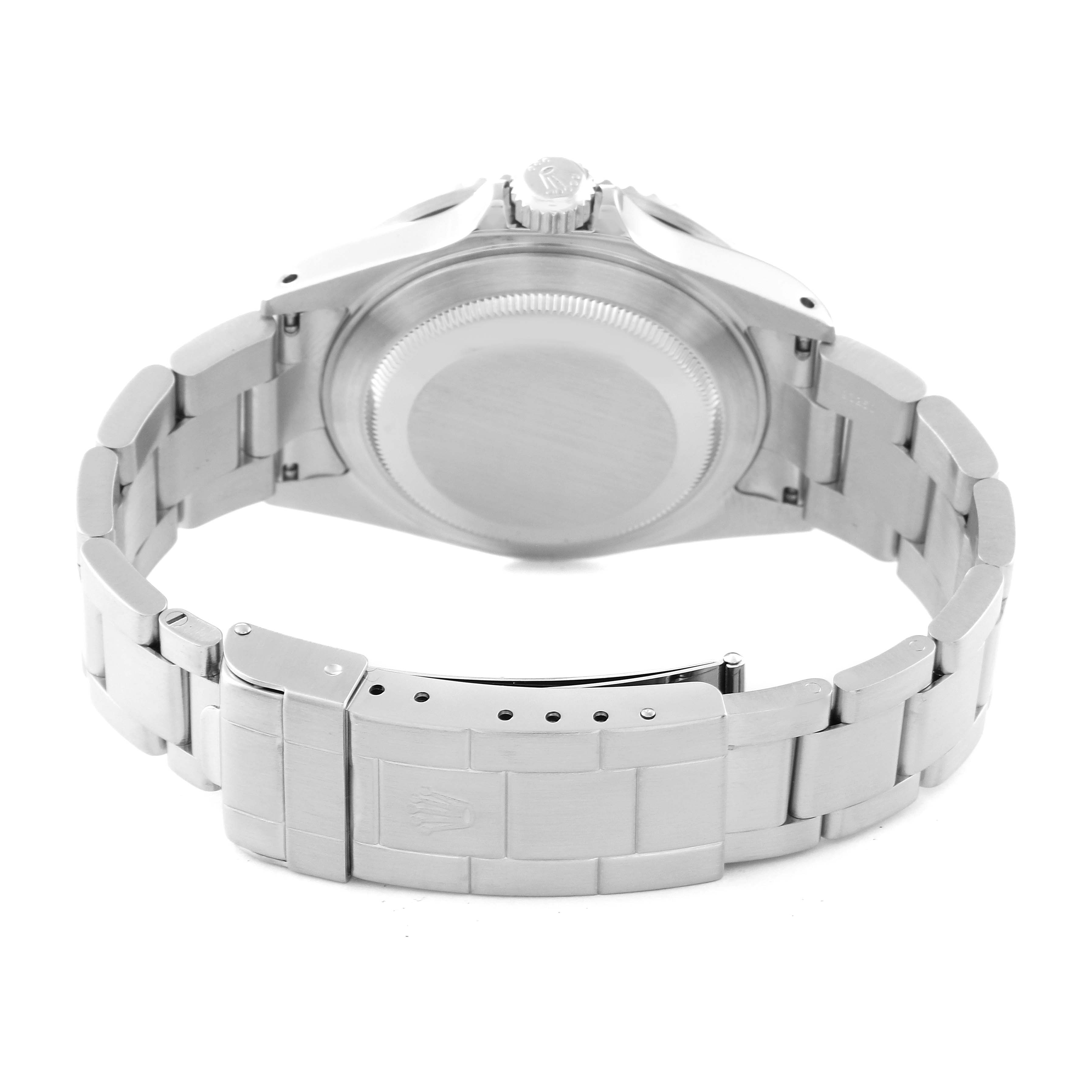 The image shows the back view of a Rolex Submariner 16610 Men
s Stainless Steel Black Dial 16610 Men
s Stainless Steel Black Dial watch, displaying its case back and bracelet clasp.