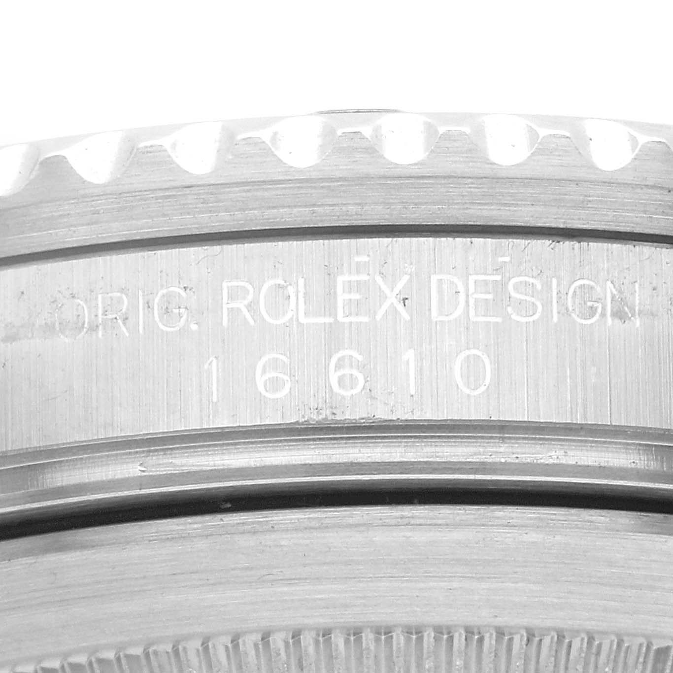 This close-up image shows the side of the Rolex Submariner 16610 Men
s Stainless Steel Black Dial 16610 Men
s Stainless Steel Black Dial watch case, featuring the model number 16610.