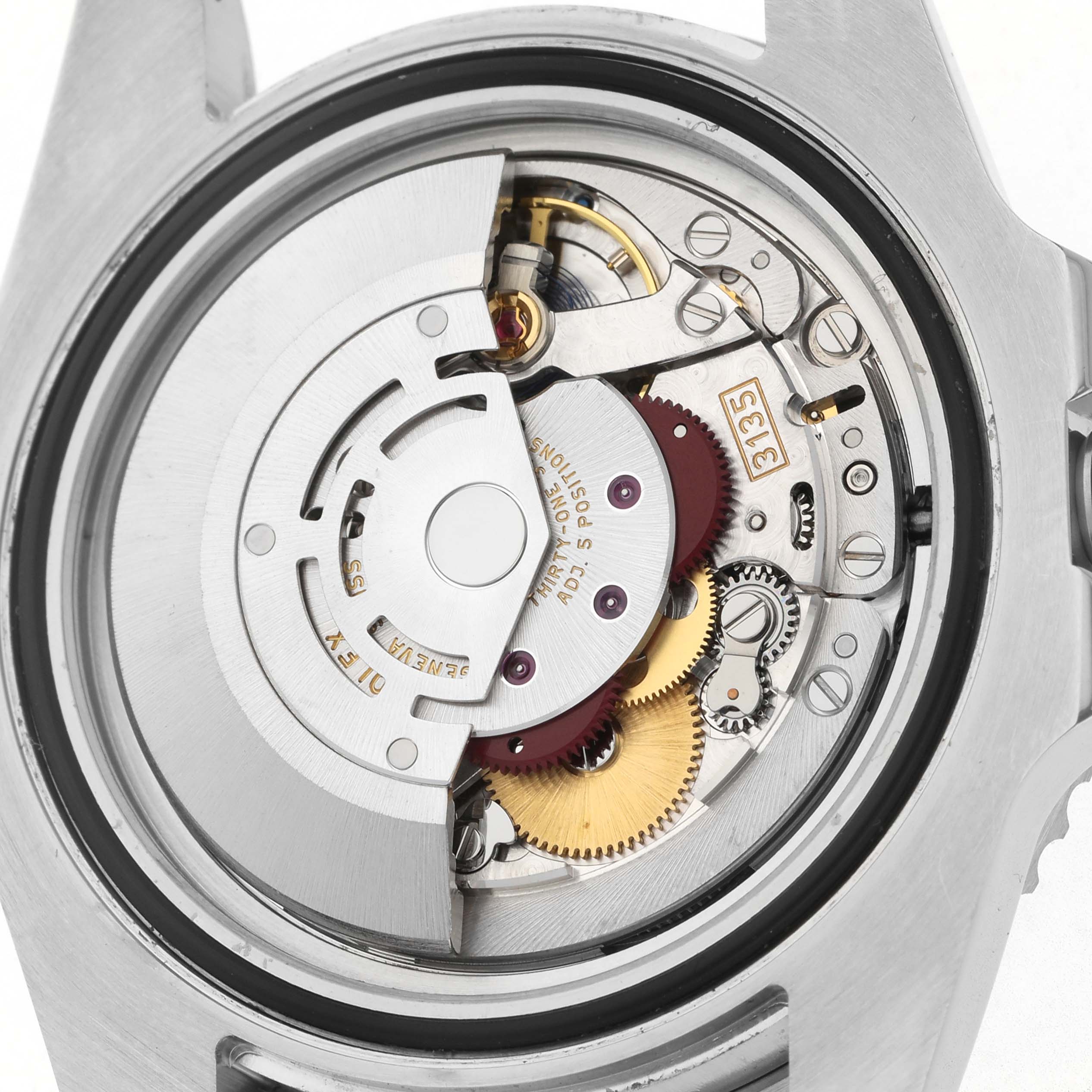 The image shows the back view of a Rolex Submariner 116610LV Men's Stainless Steel Green Dial, highlighting the movement and intricate internal gears.