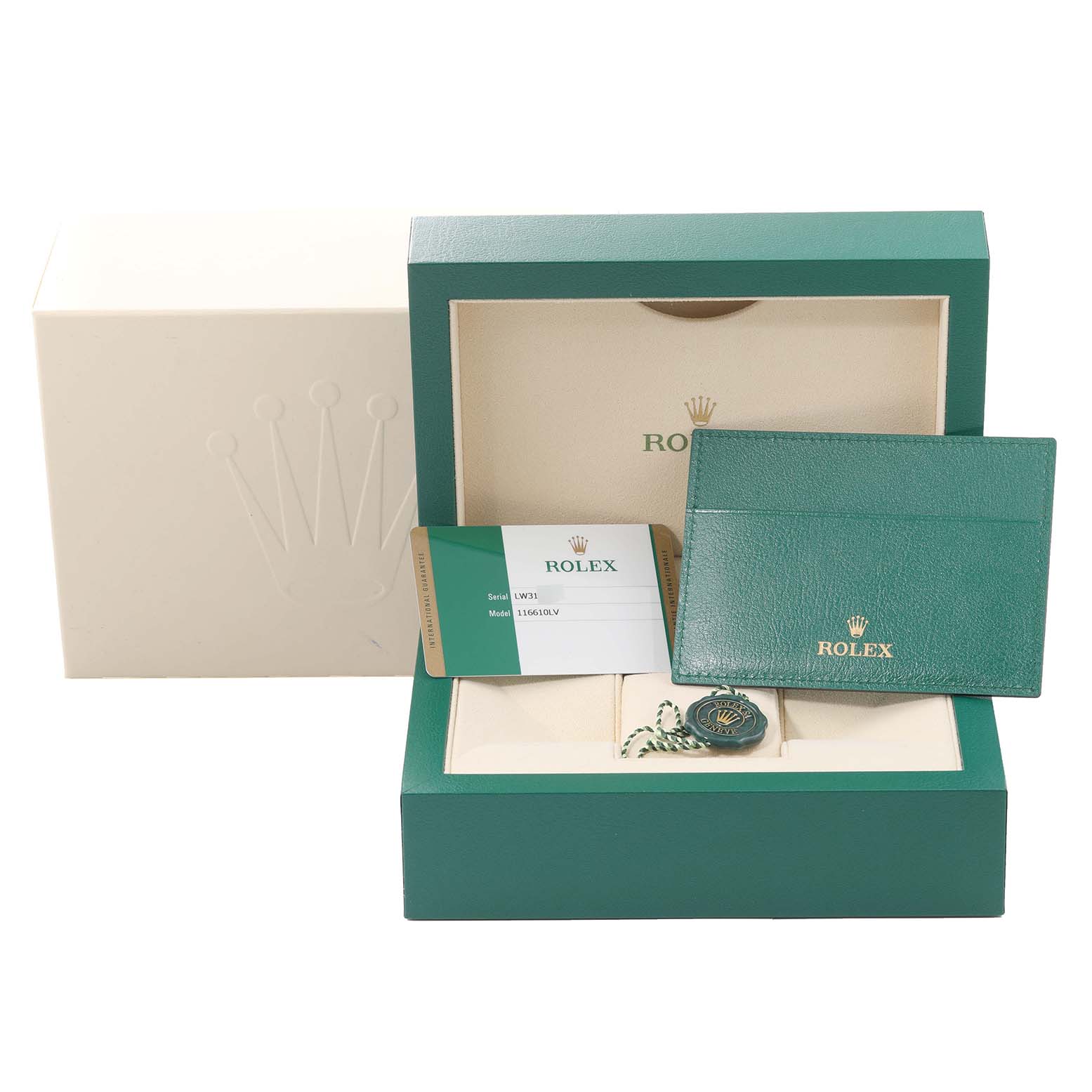 The image shows the open box and accessories for a Rolex Submariner 116610LV Men
s Stainless Steel Green Dial 116610LV Men
s Stainless Steel Green Dial watch, including warranty cards and a green card holder.