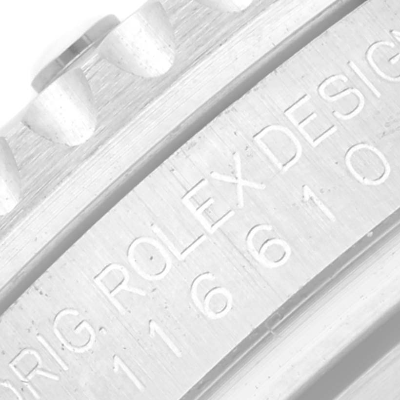 This close-up image of a Rolex Submariner 116610LV Men
s Stainless Steel Green Dial 116610LV Men
s Stainless Steel Green Dial watch shows part of the bezel and engraved model number "116610" on the case.