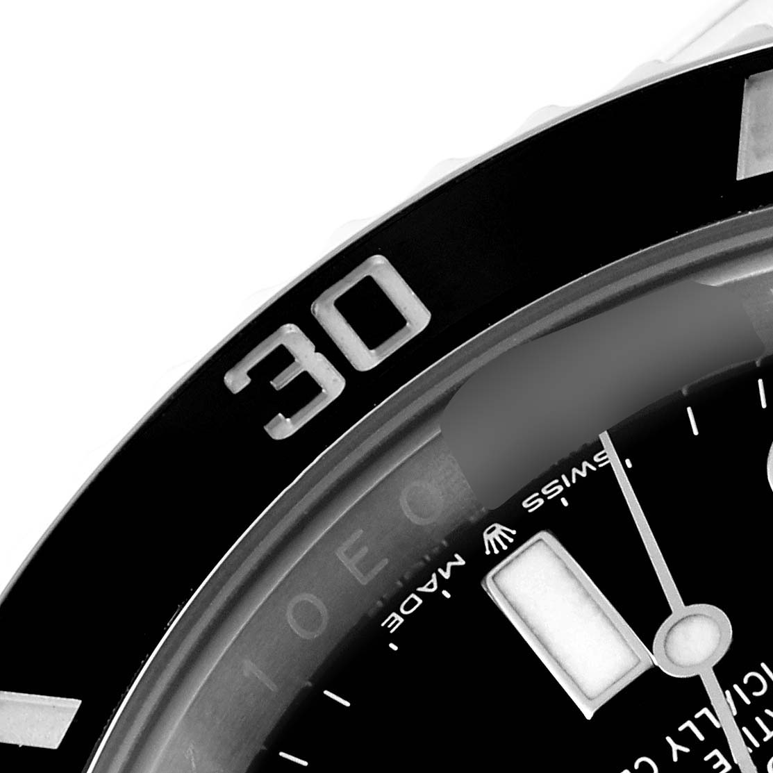 This image shows a close-up of the bezel and dial of a Rolex Submariner 124060 Men's Stainless Steel Black Dial 124060 Men's Stainless Steel Black Dial watch, highlighting the "30" marker and part of the hour hand.