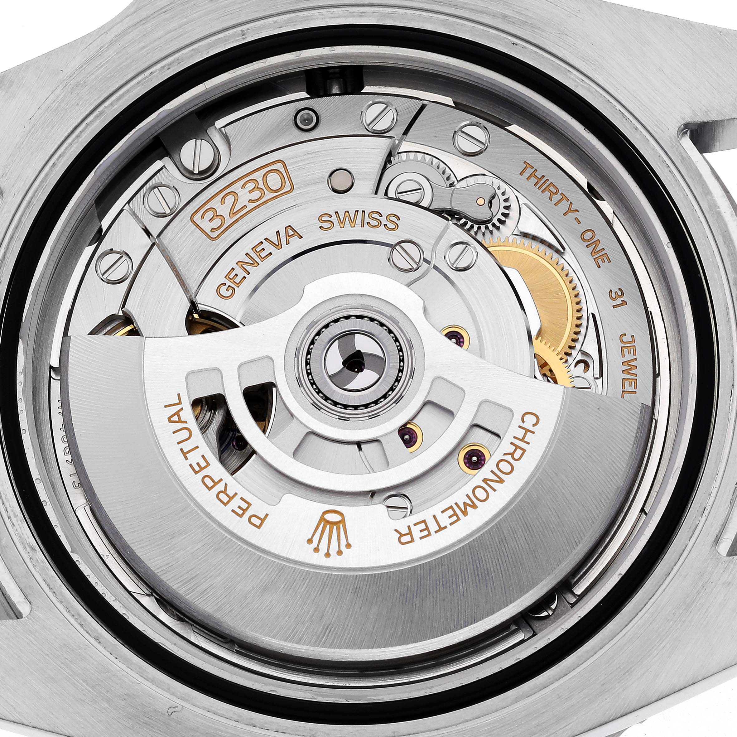 This image shows the internal movement mechanism of a Rolex Submariner 124060 Men's Stainless Steel Black Dial 124060 Men's Stainless Steel Black Dial, focusing on the intricate components and "3230" model number.