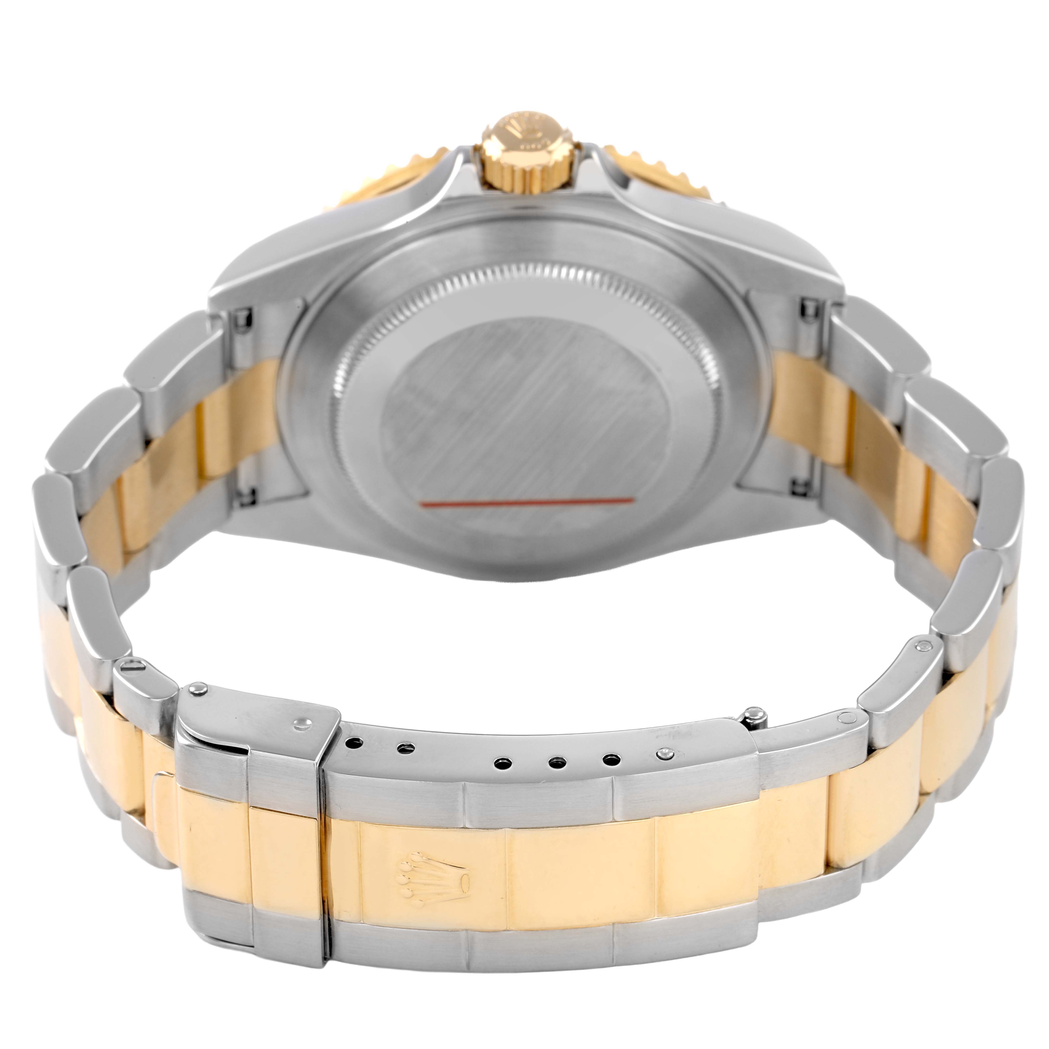 The image shows the back and bracelet of the Rolex Submariner 16613 T Men's Steel and Gold (two tone) Blue Dial, featuring a two-tone metal finish.