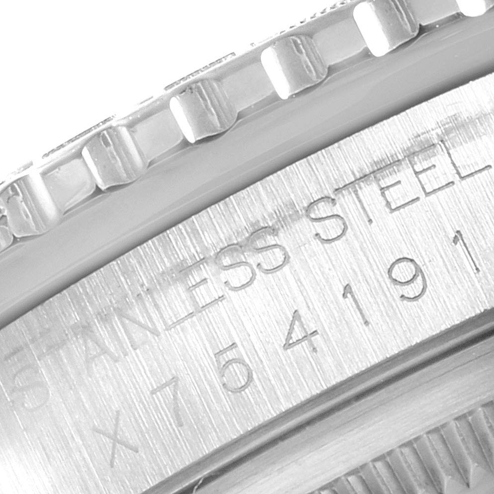 The image shows a close-up of the bezel and part of the stainless steel casing with the serial number of a Rolex Datejust 17886 Men
s Stainless Steel Grey Dial 17886 Men
s Stainless Steel Grey Dial watch.