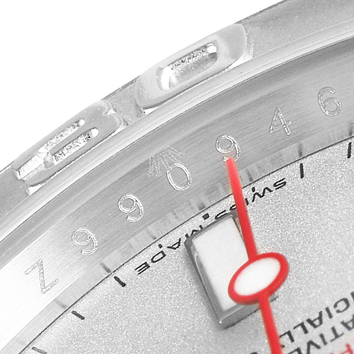 This is a close-up angle of the Rolex Yacht-Master 16622 Men
s Stainless Steel Silver Dial 16622 Men
s Stainless Steel Silver Dial watch face, showing the red second hand, numerals, and part of the bezel.
