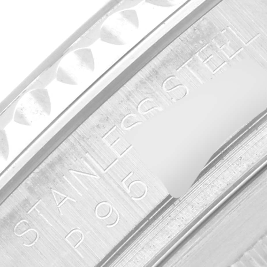 The image shows a close-up of the stainless steel engraving on the Rolex Yacht-Master 16622 Men's Stainless Steel Silver Dial 16622 Men's Stainless Steel Silver Dial watch bezel.